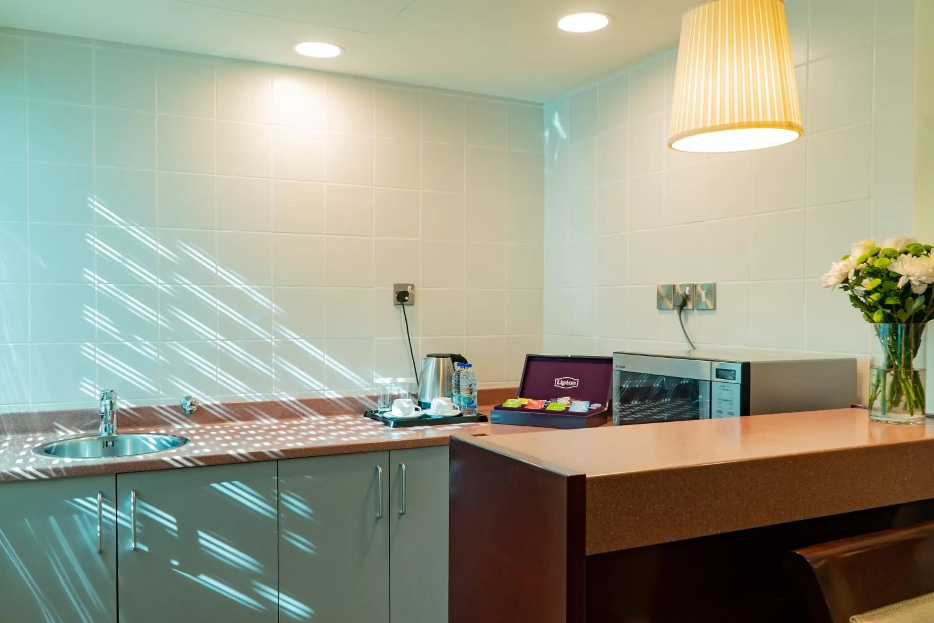 Kitchen or kitchenette in Al Ain Palace Hotel Abu Dhabi