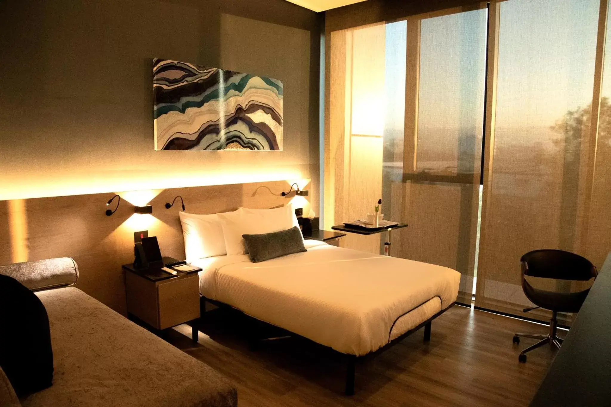 Bed in QUARTZ HOTEL & SPA