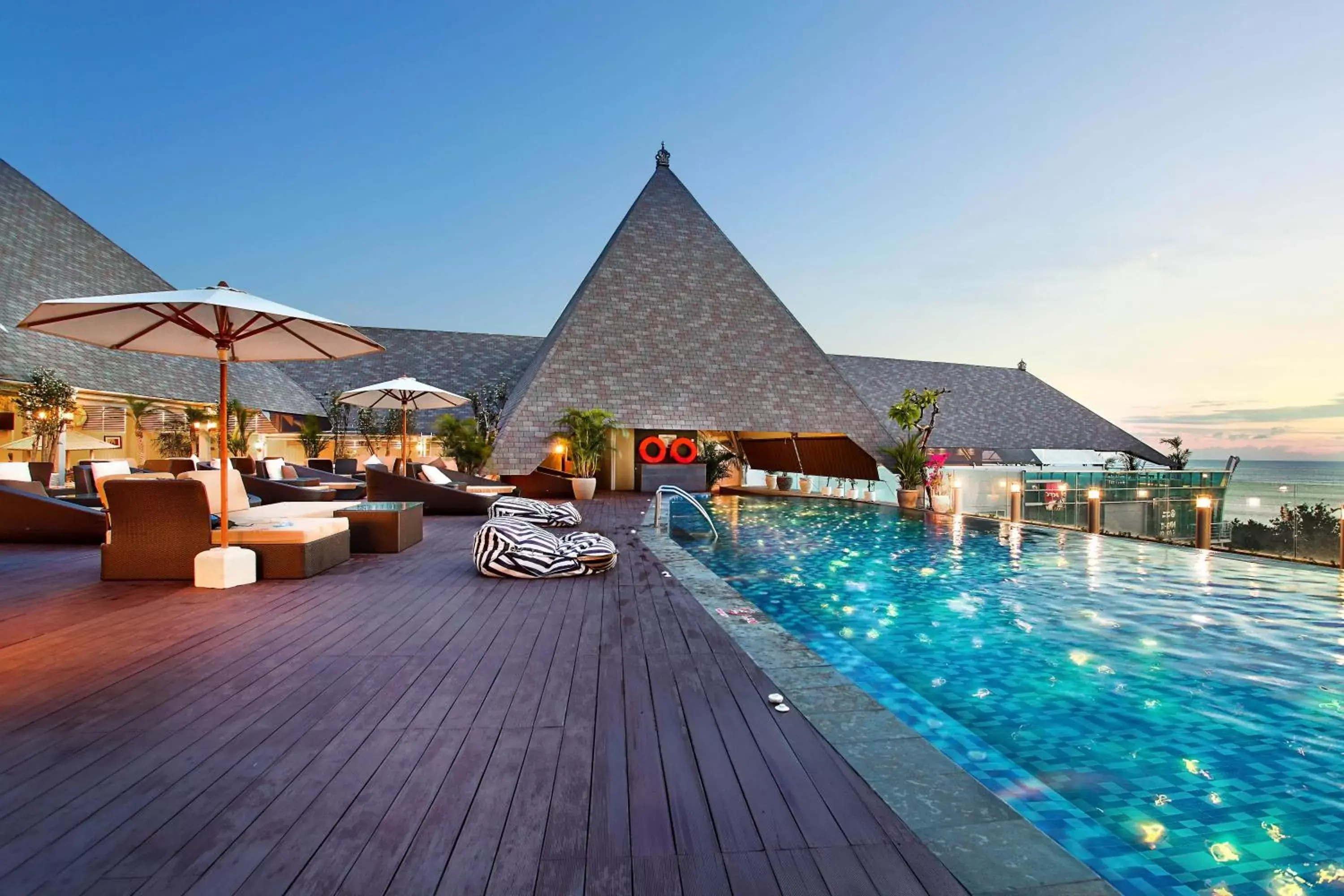 Property building, Swimming Pool in The Kuta Beach Heritage Hotel - Managed by Accor