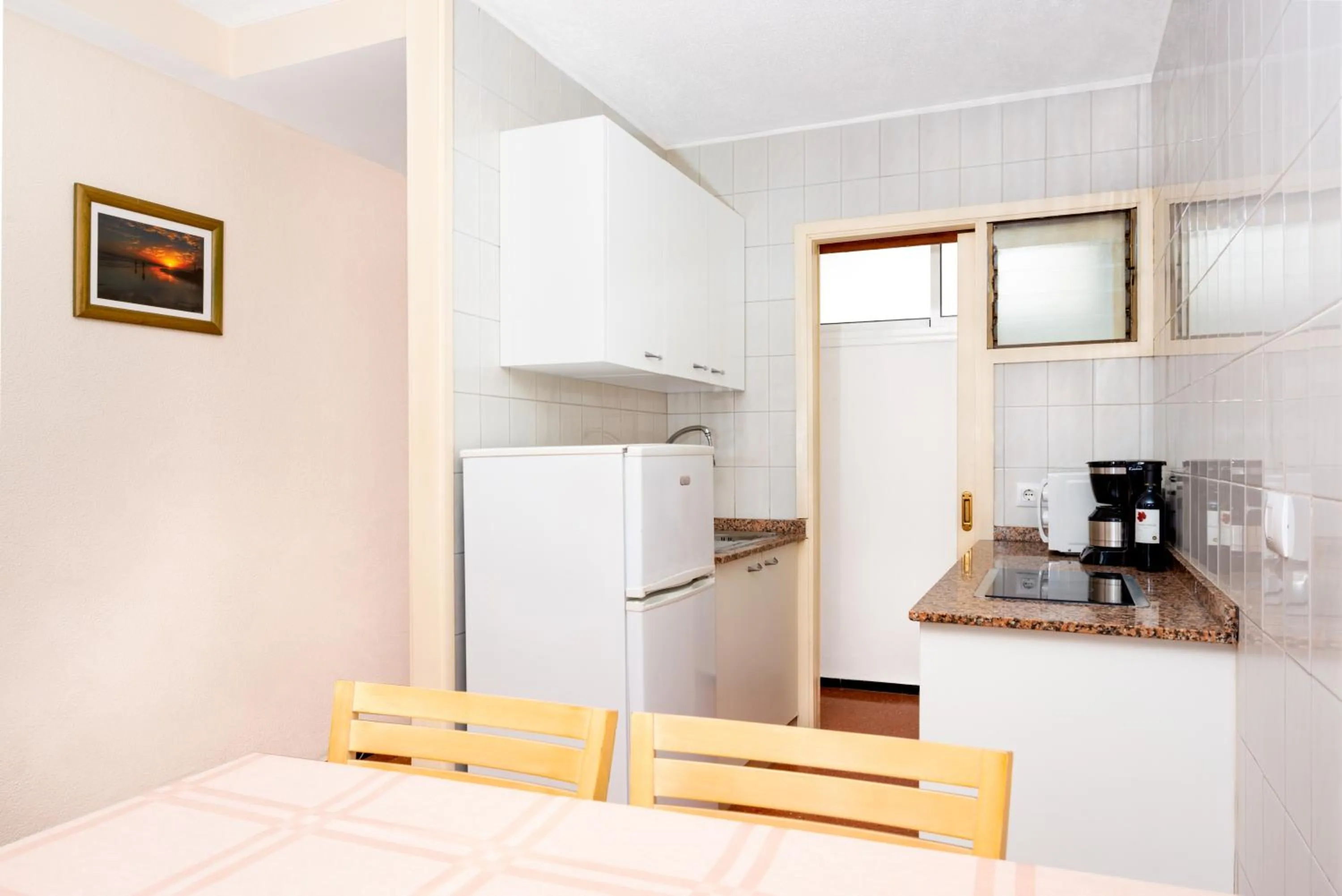 Kitchen or kitchenette in Apartamentos las Góndolas