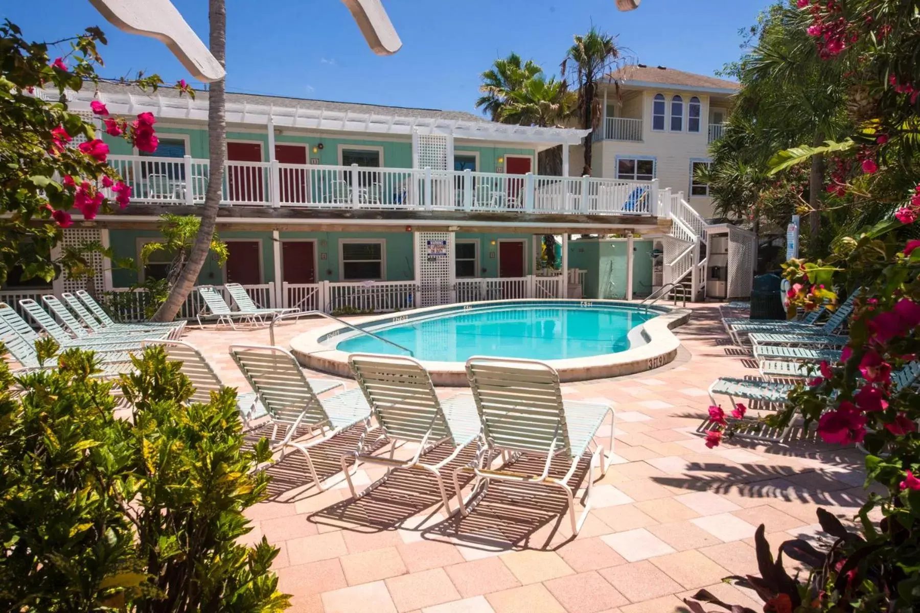 Property building, Swimming Pool in Tropic Isle At Anna Maria Island Inn