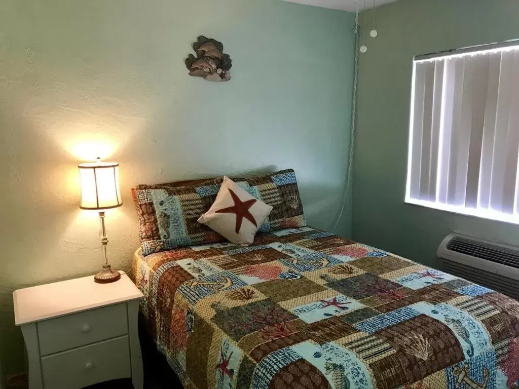 Bed in South Beach Inn - Cocoa Beach