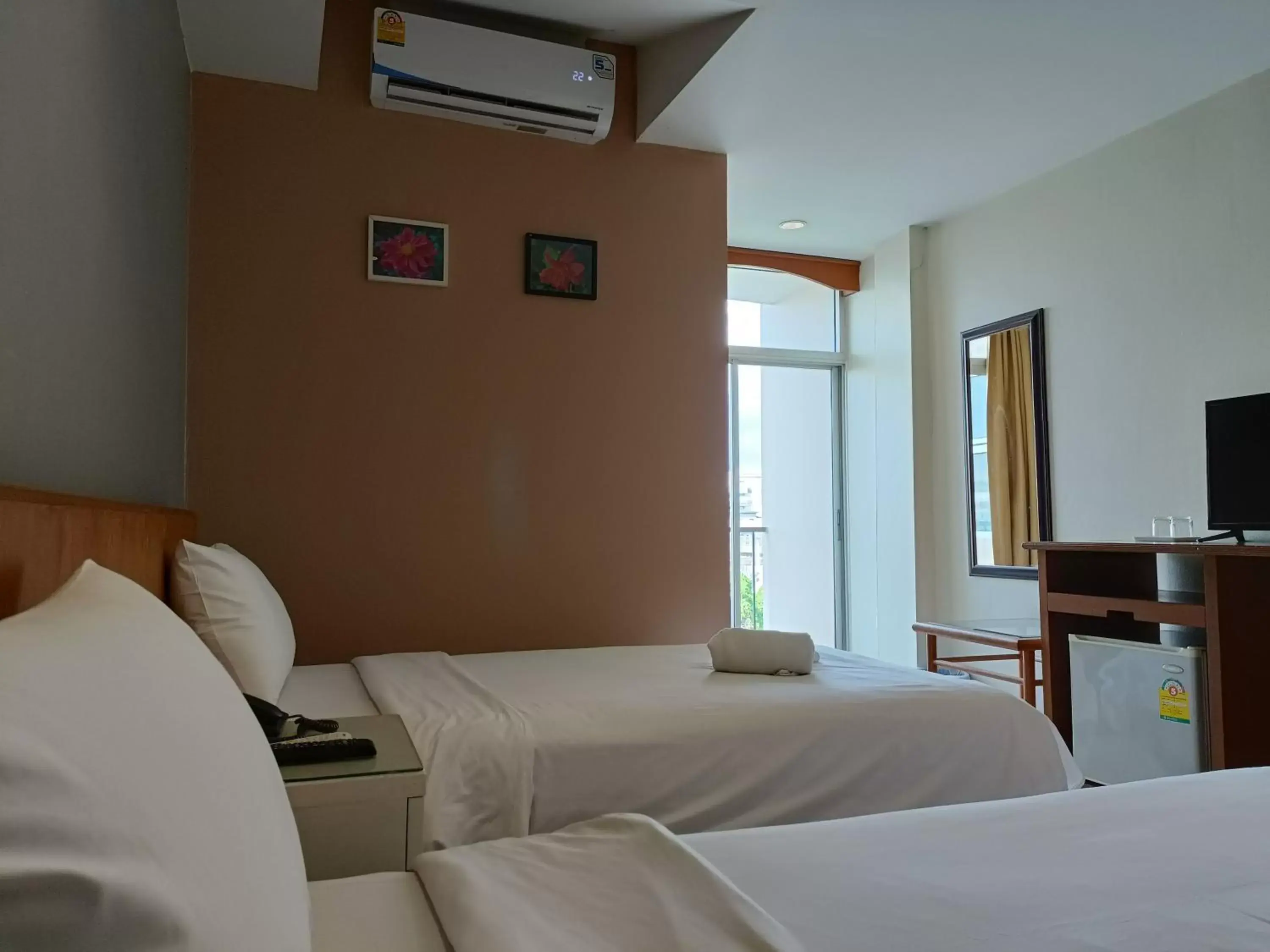 Bed in JL Bangkok Hotel