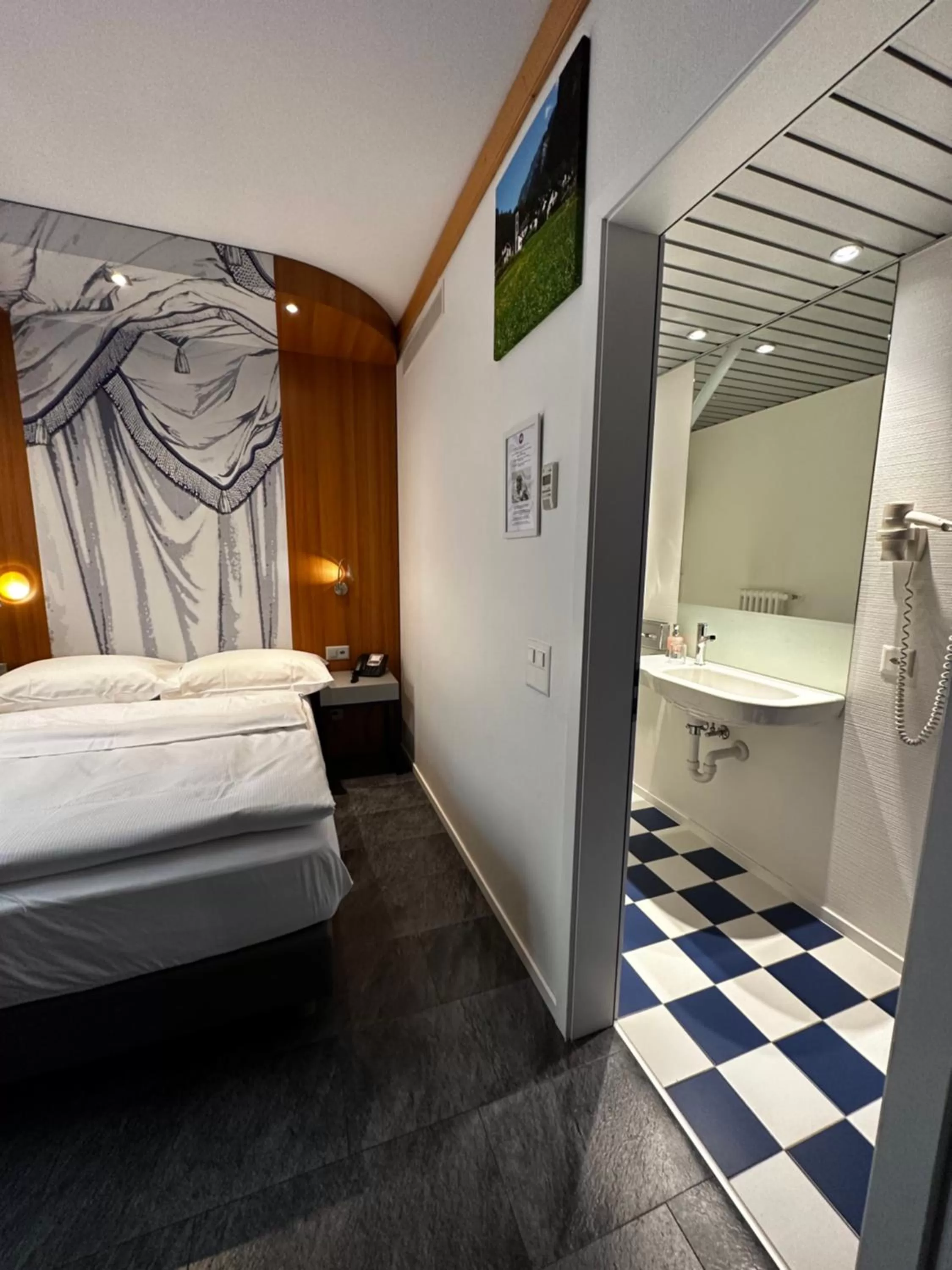 Bed in Albergo Carcani by Ketty & Tommy