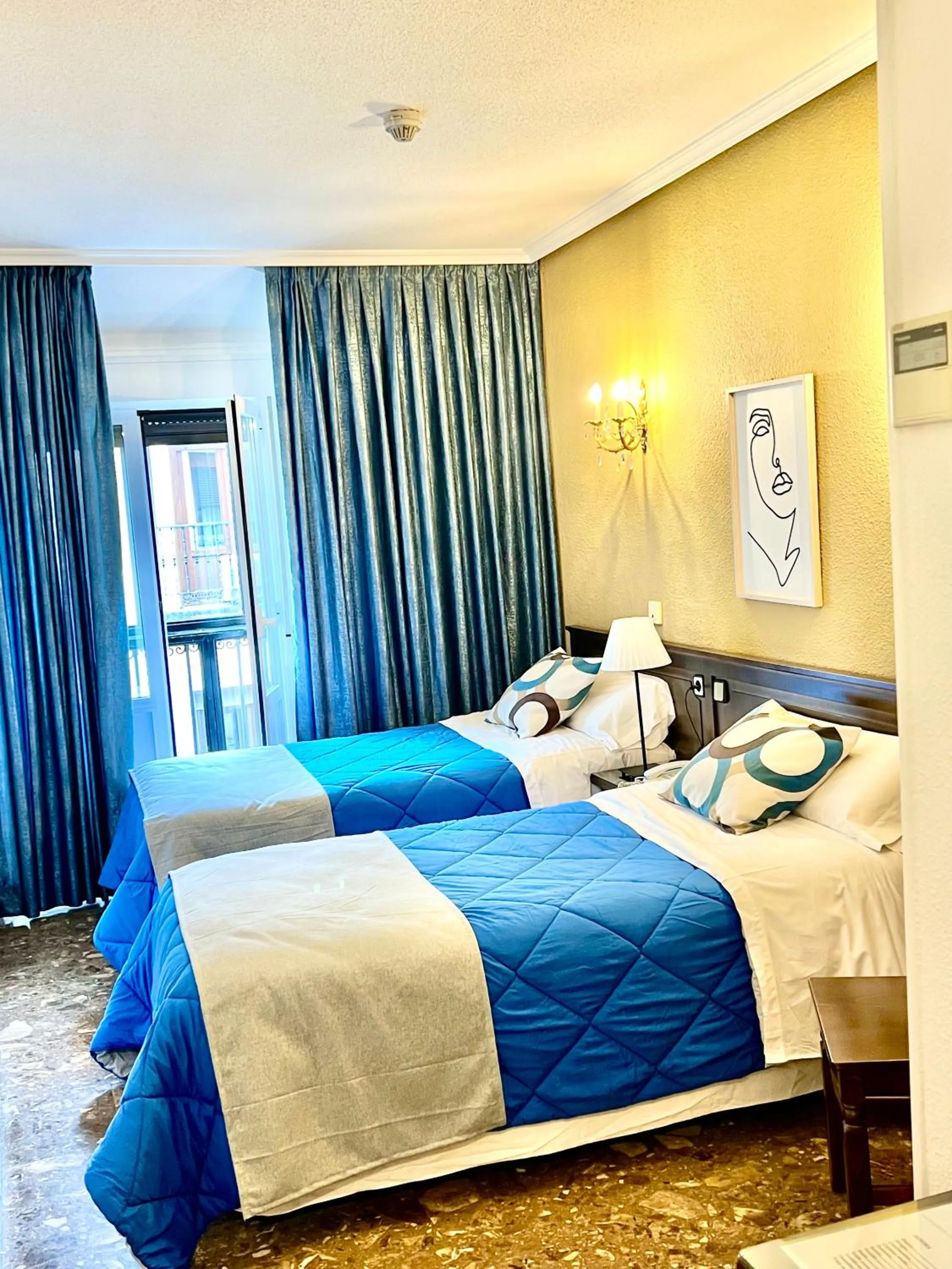 Photo of the whole room, Bed in Hostal Sonsoles Madrid-Centro