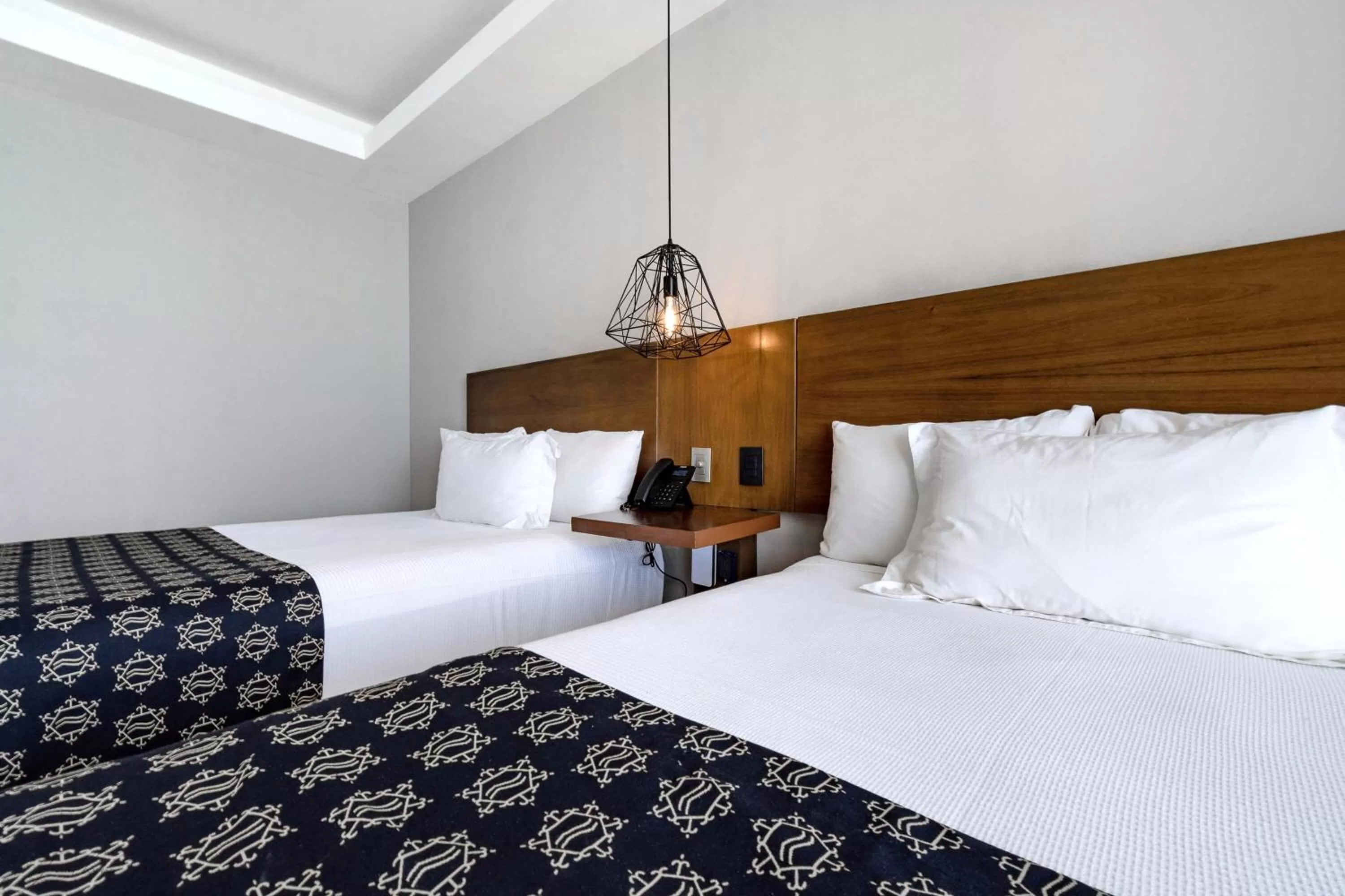 Bed in Ocean Dream Cancun by GuruHotel