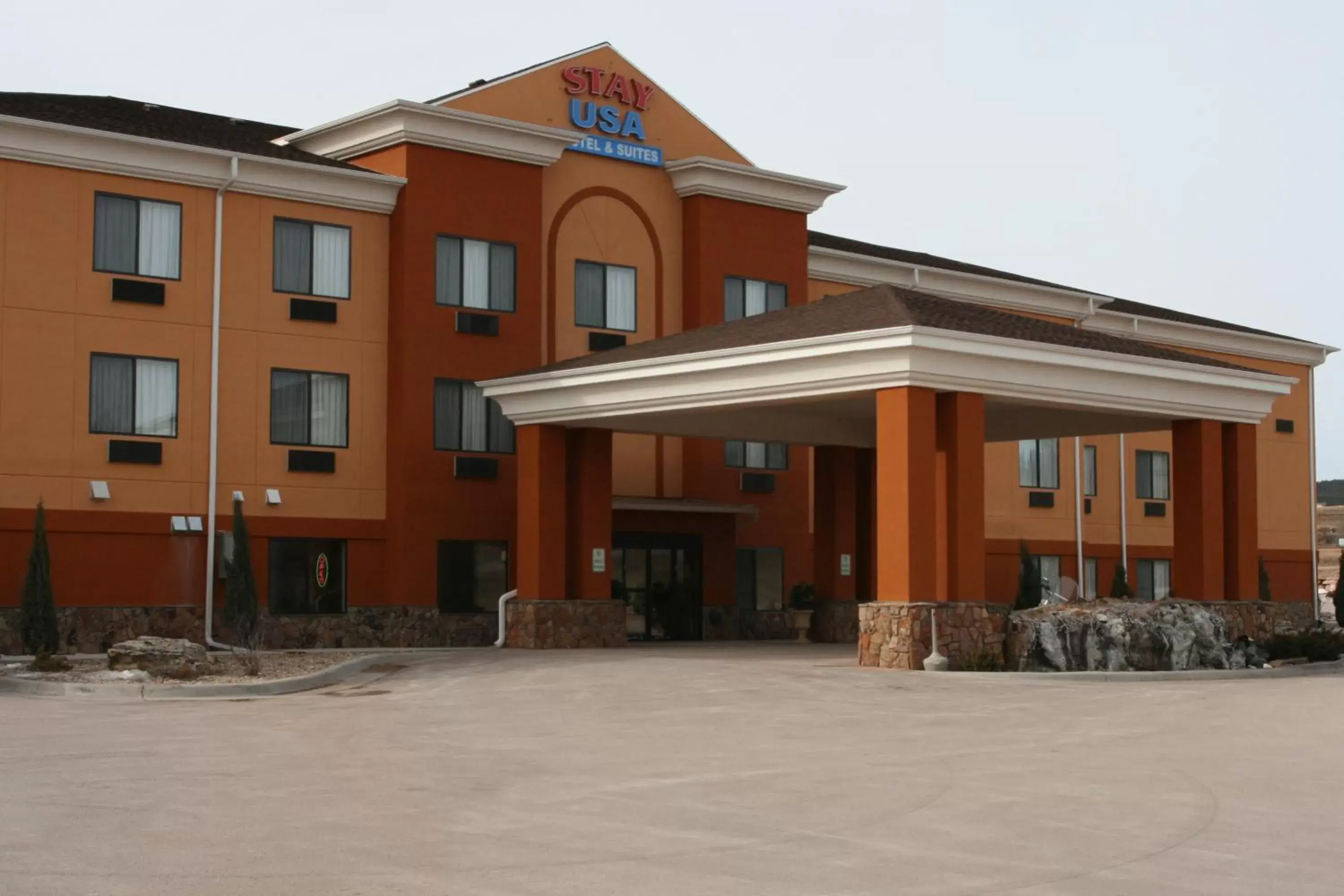 Facade/entrance, Property Building in Stay USA Hotel and Suites