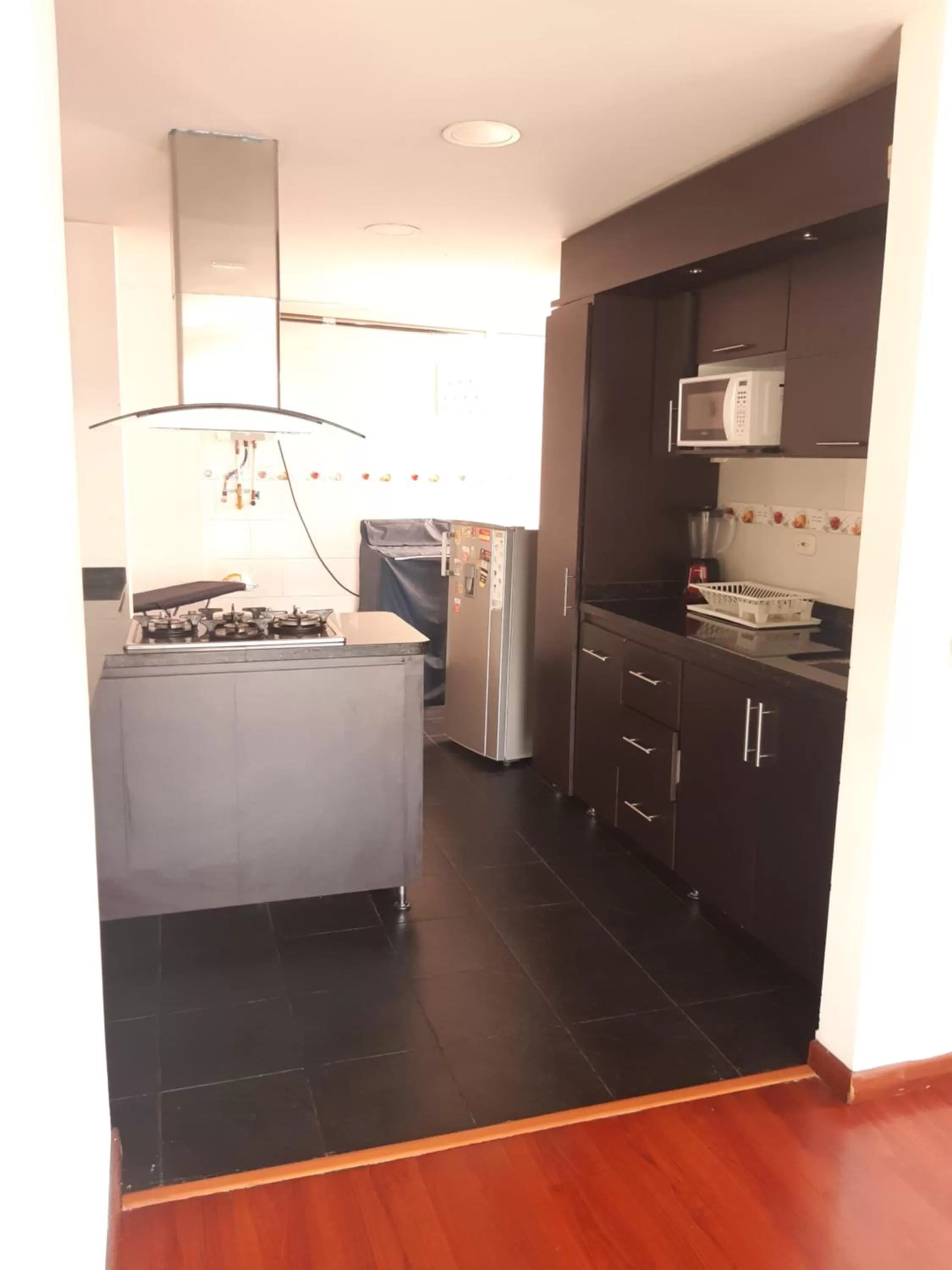 Kitchen or kitchenette in Apartamentos Plaza Modelia
