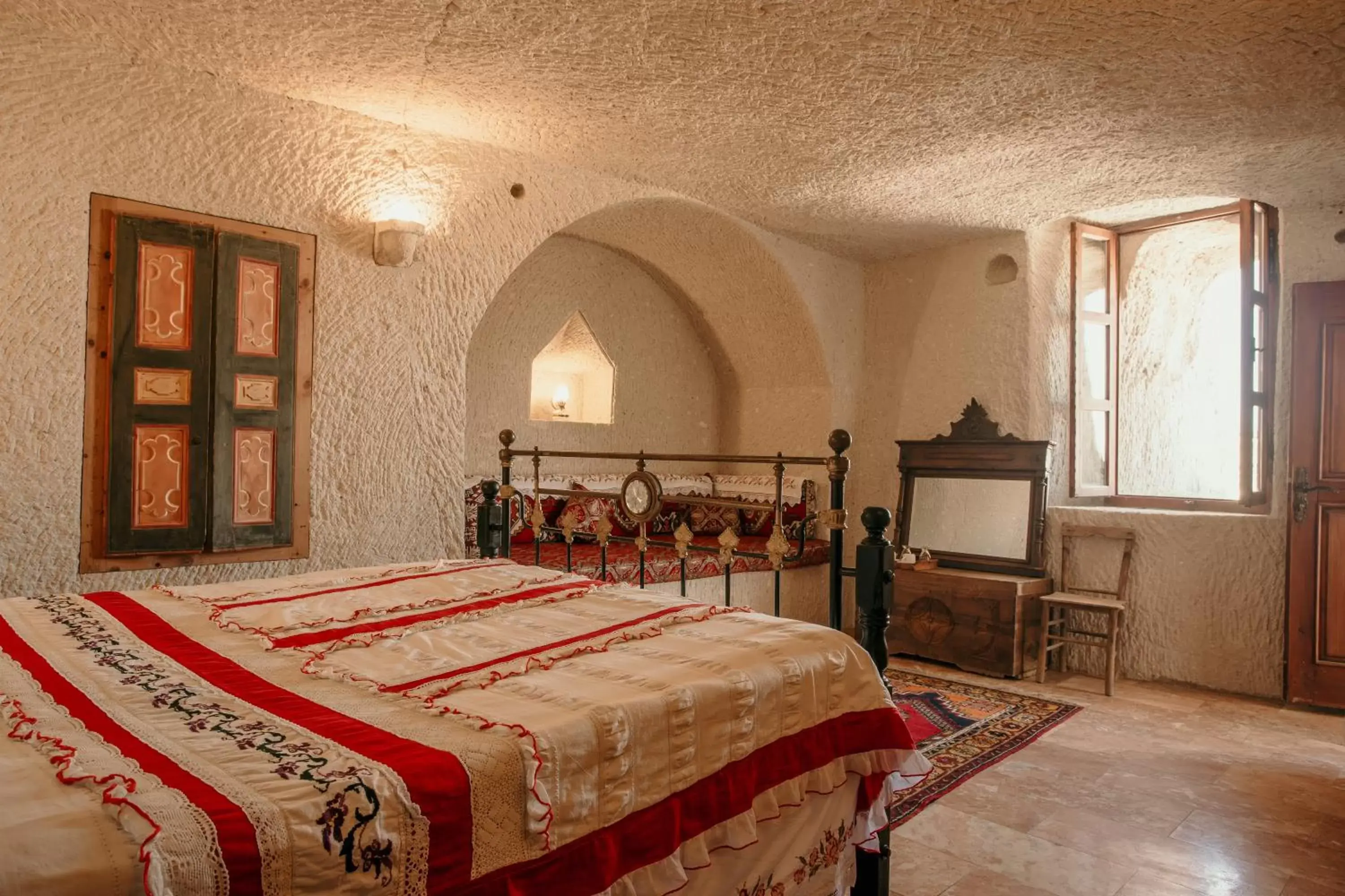 Bed in Village Cave House Hotel