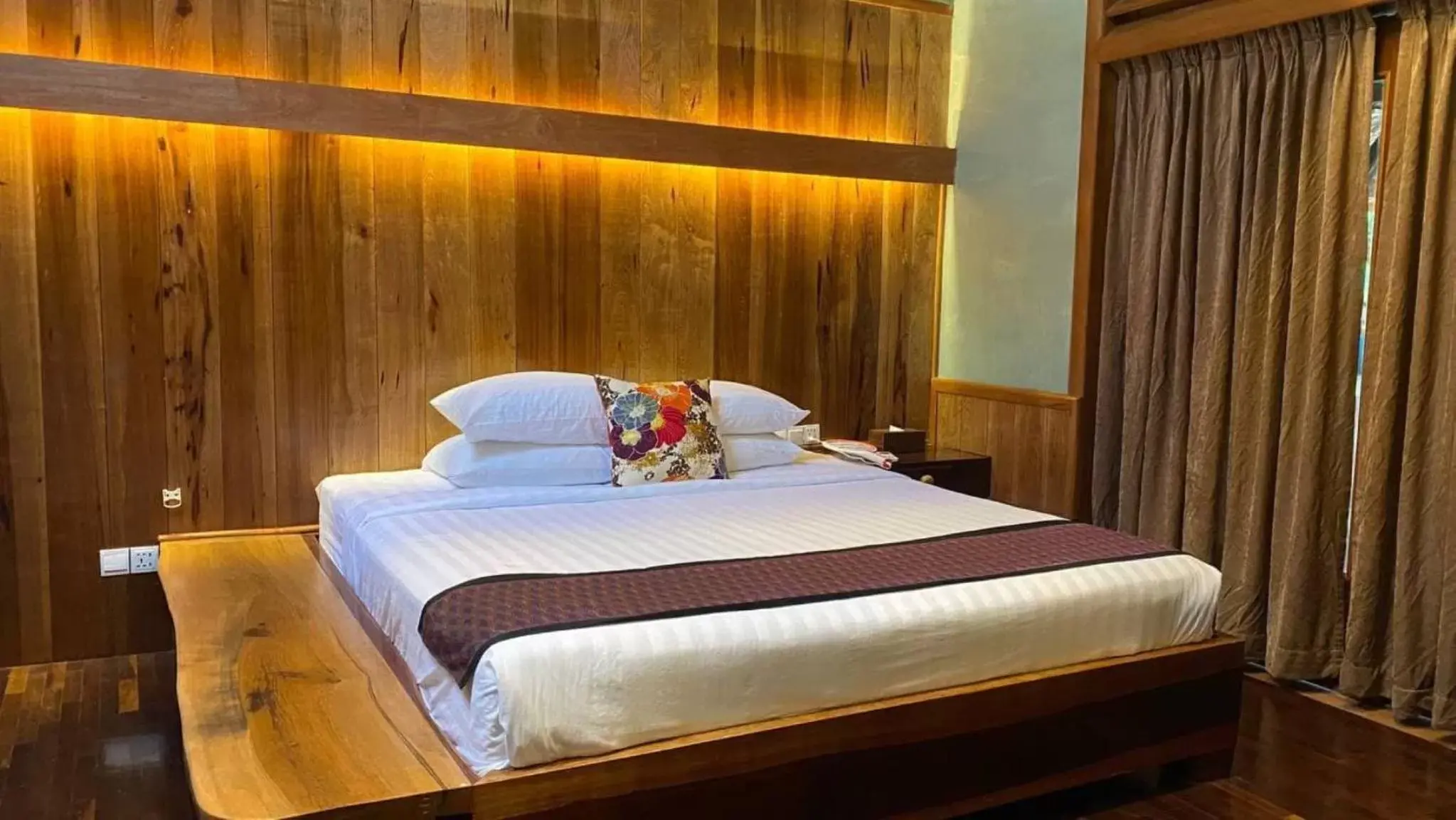 Bed in Veranda Natural Resort