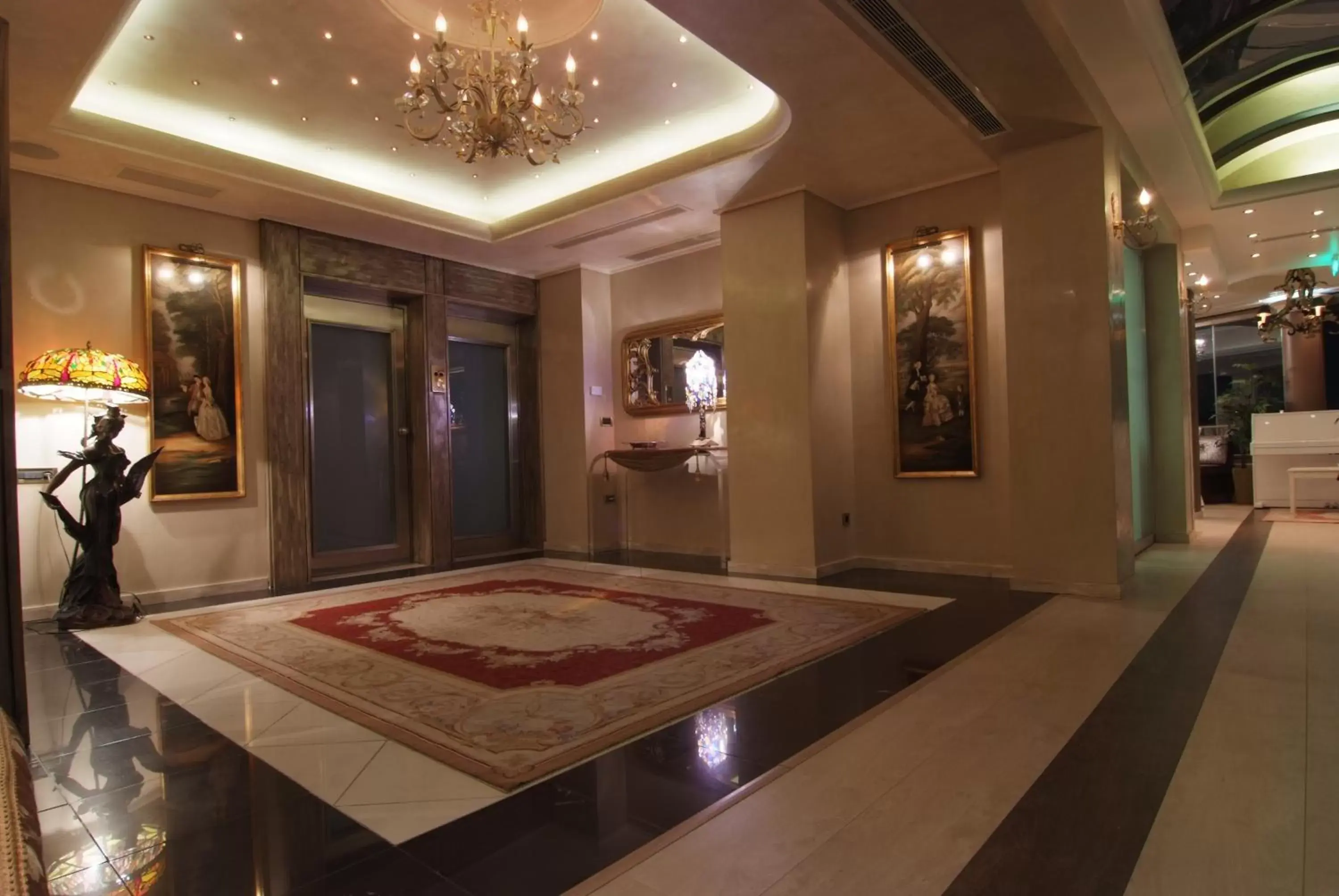 Lobby or reception in The Athenian Callirhoe Exclusive Hotel