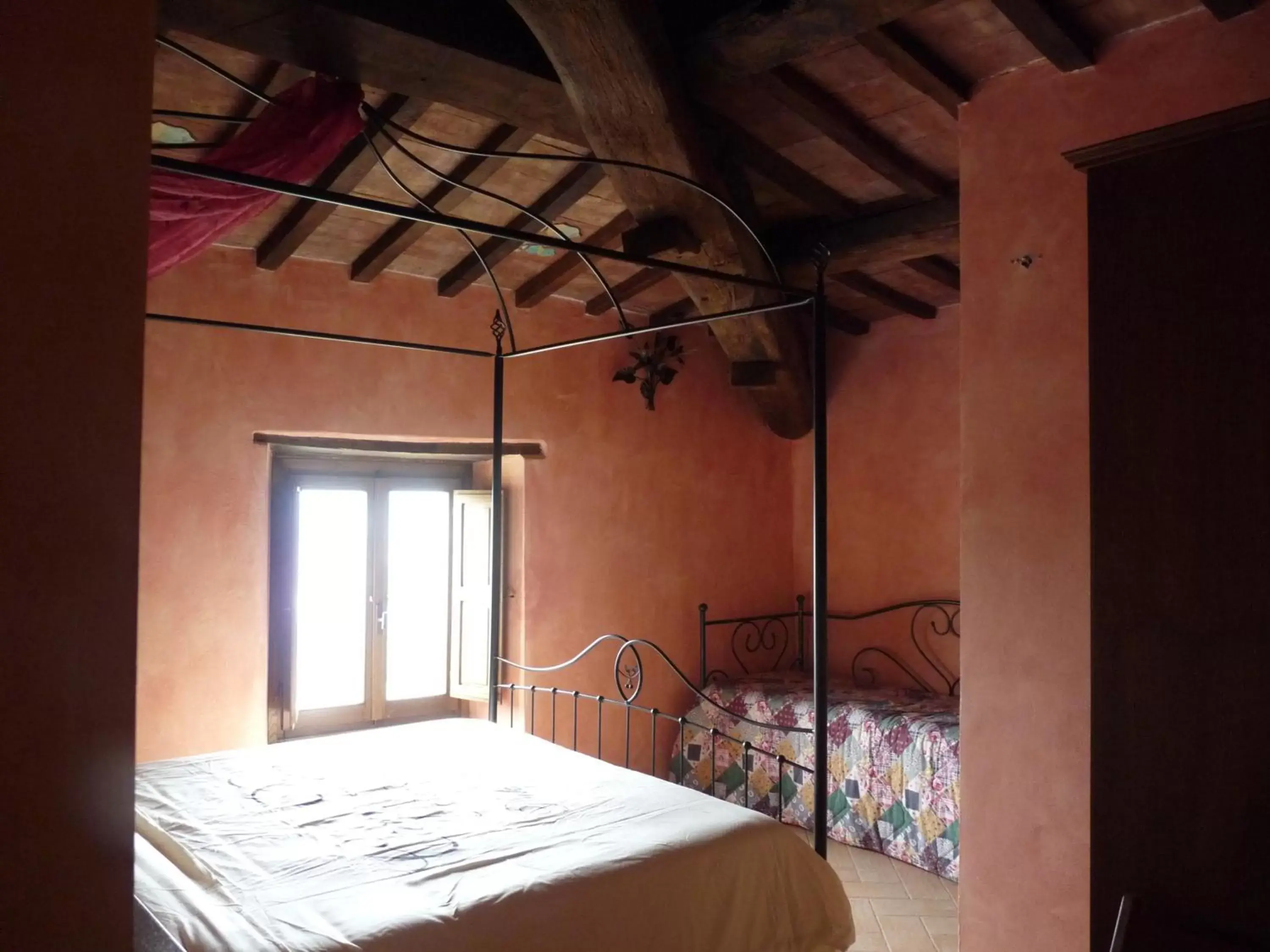 Photo of the whole room, Bed in Castello Di Giomici