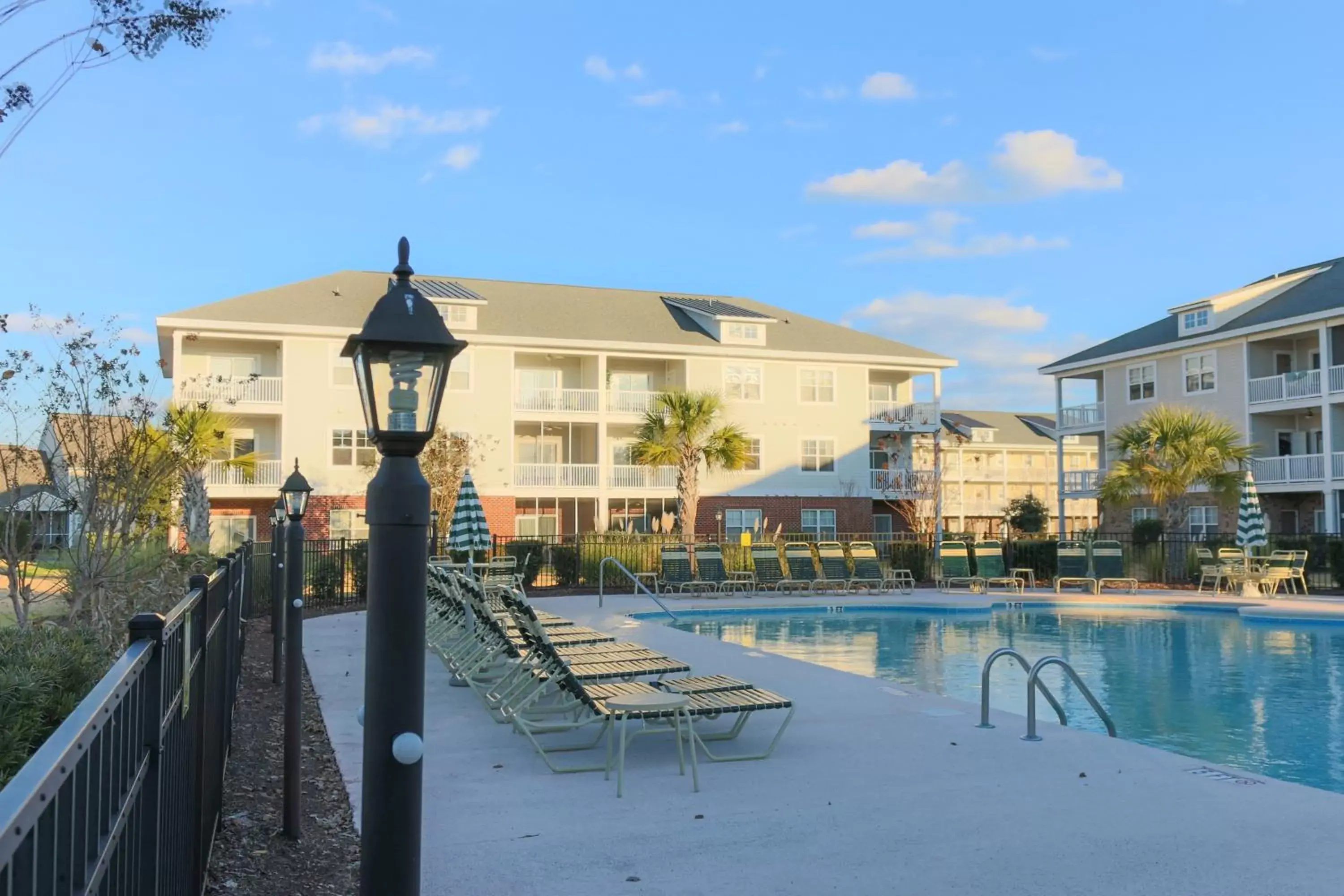 Facade/entrance, Swimming Pool in River Oaks Golf Resort