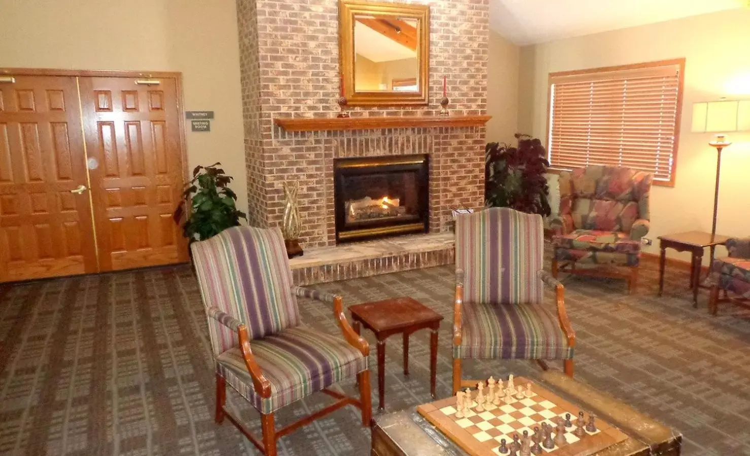 Lobby or reception, Seating Area in AmericInn by Wyndham Marshall