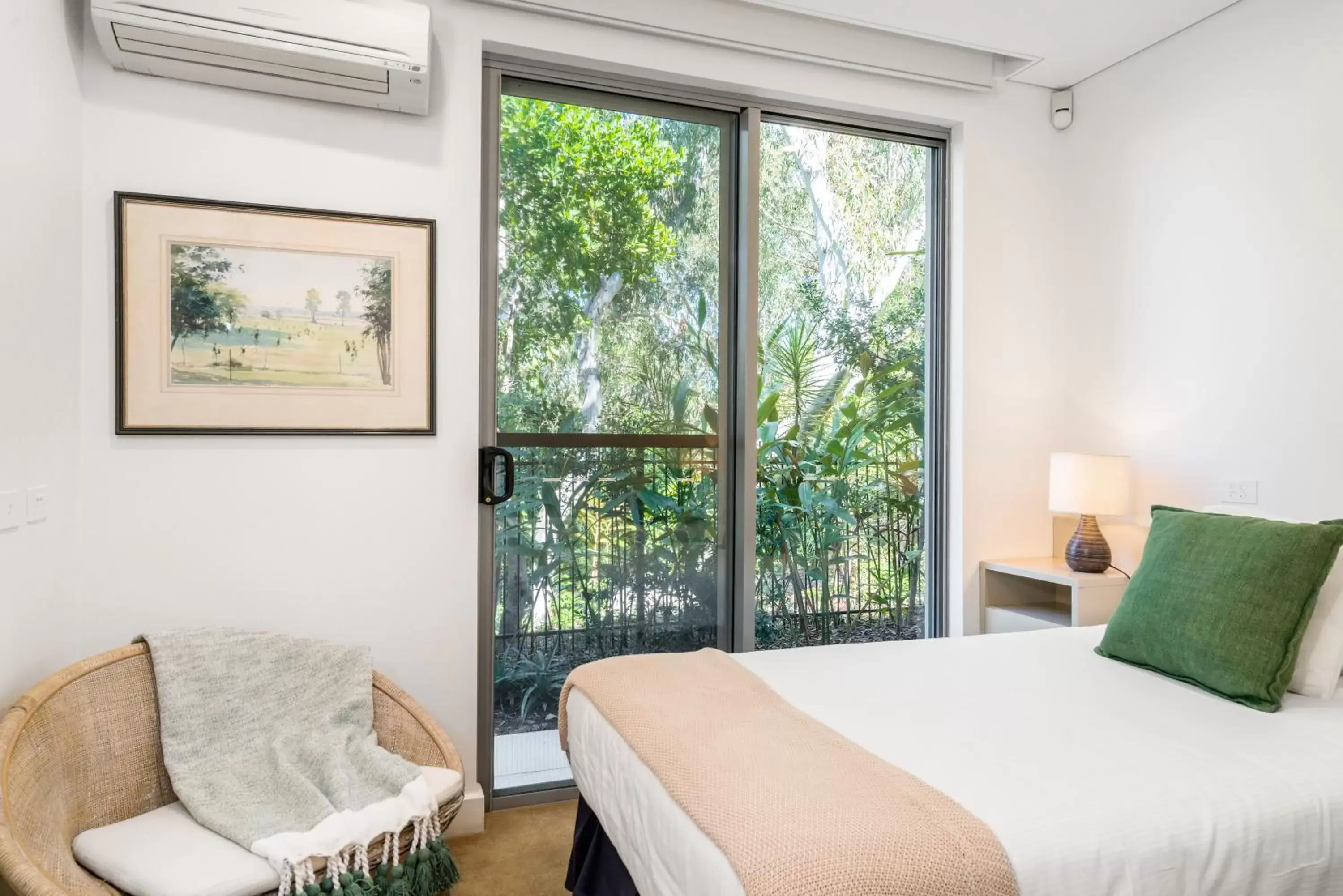 Bedroom, Bed in The Oasis Apartments and Treetop Houses