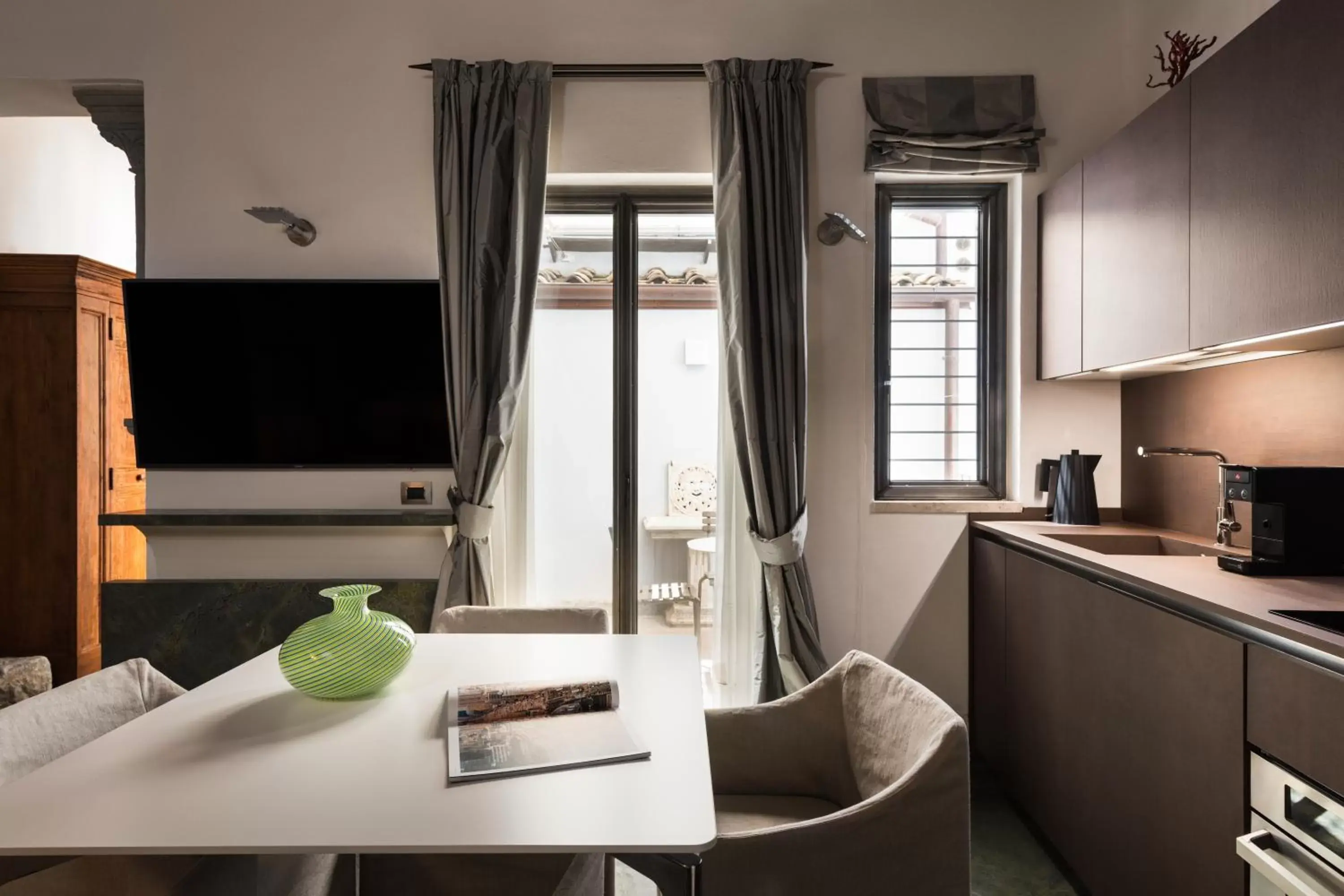 Living room, TV/Entertainment Center in Palazzo Delle Pietre - Luxury Apartments