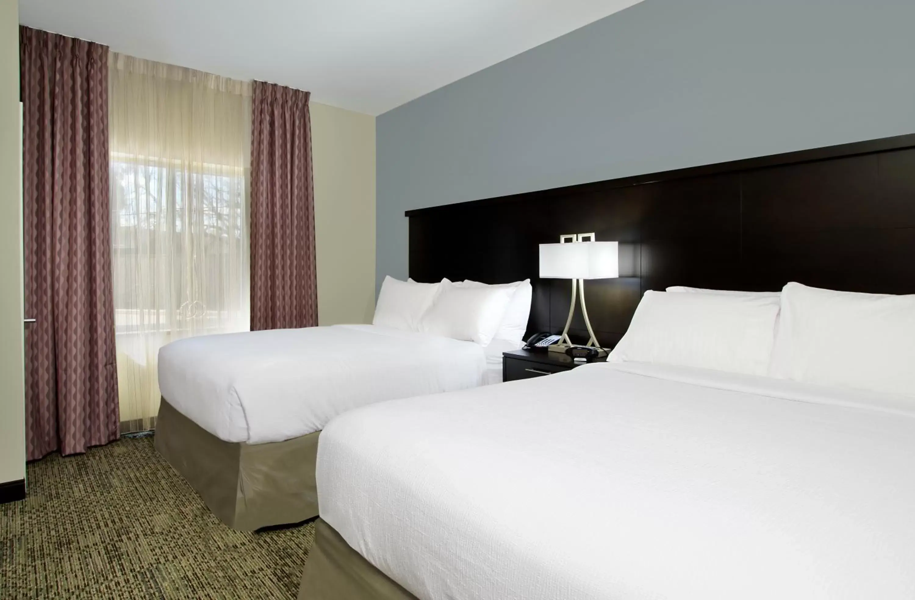 Bedroom, Bed in Staybridge Suites - Houston - Medical Center, an IHG Hotel