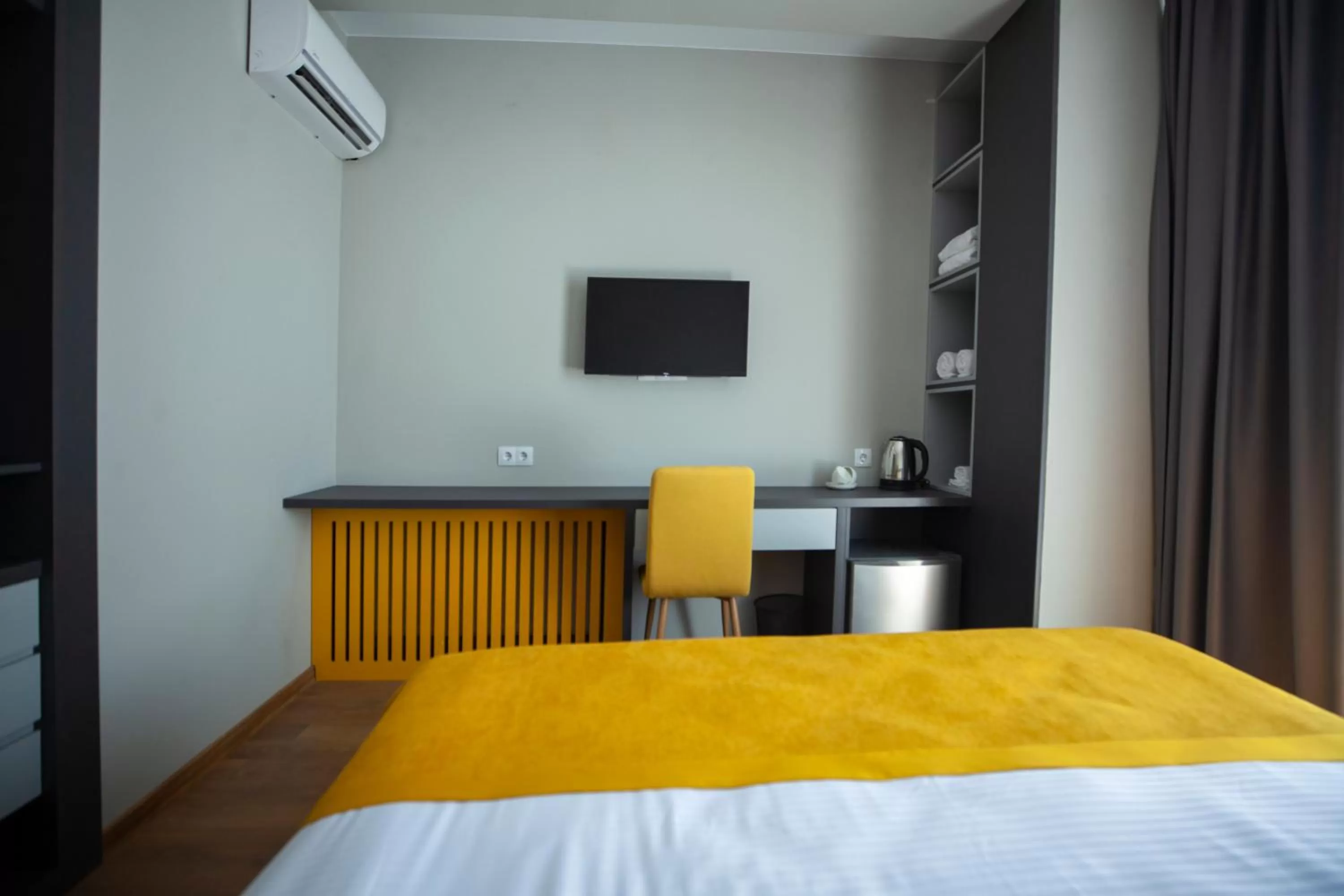 Seating area, Bed in Old City Boutique Hotel