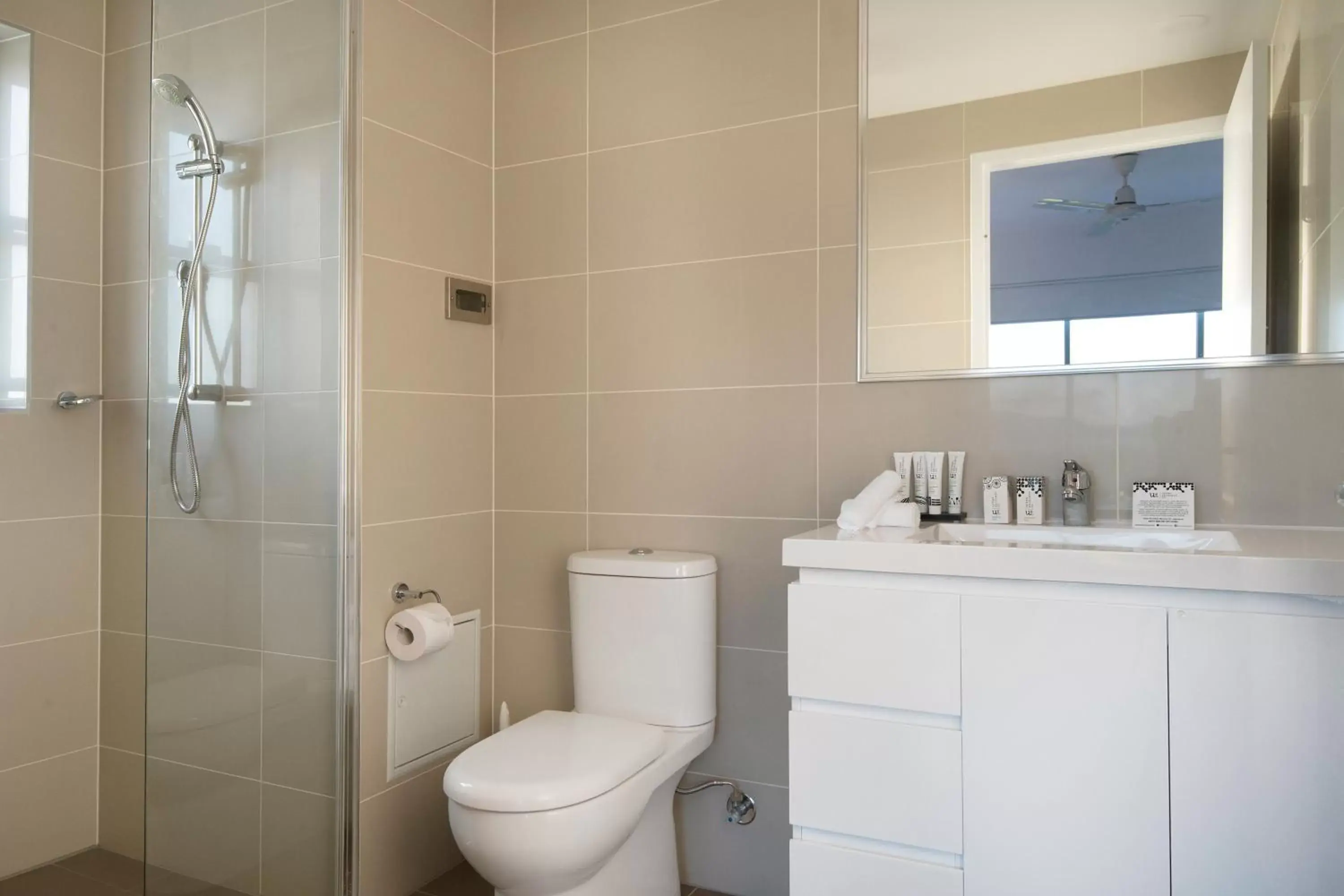 Bathroom in Allure Hotel & Apartments