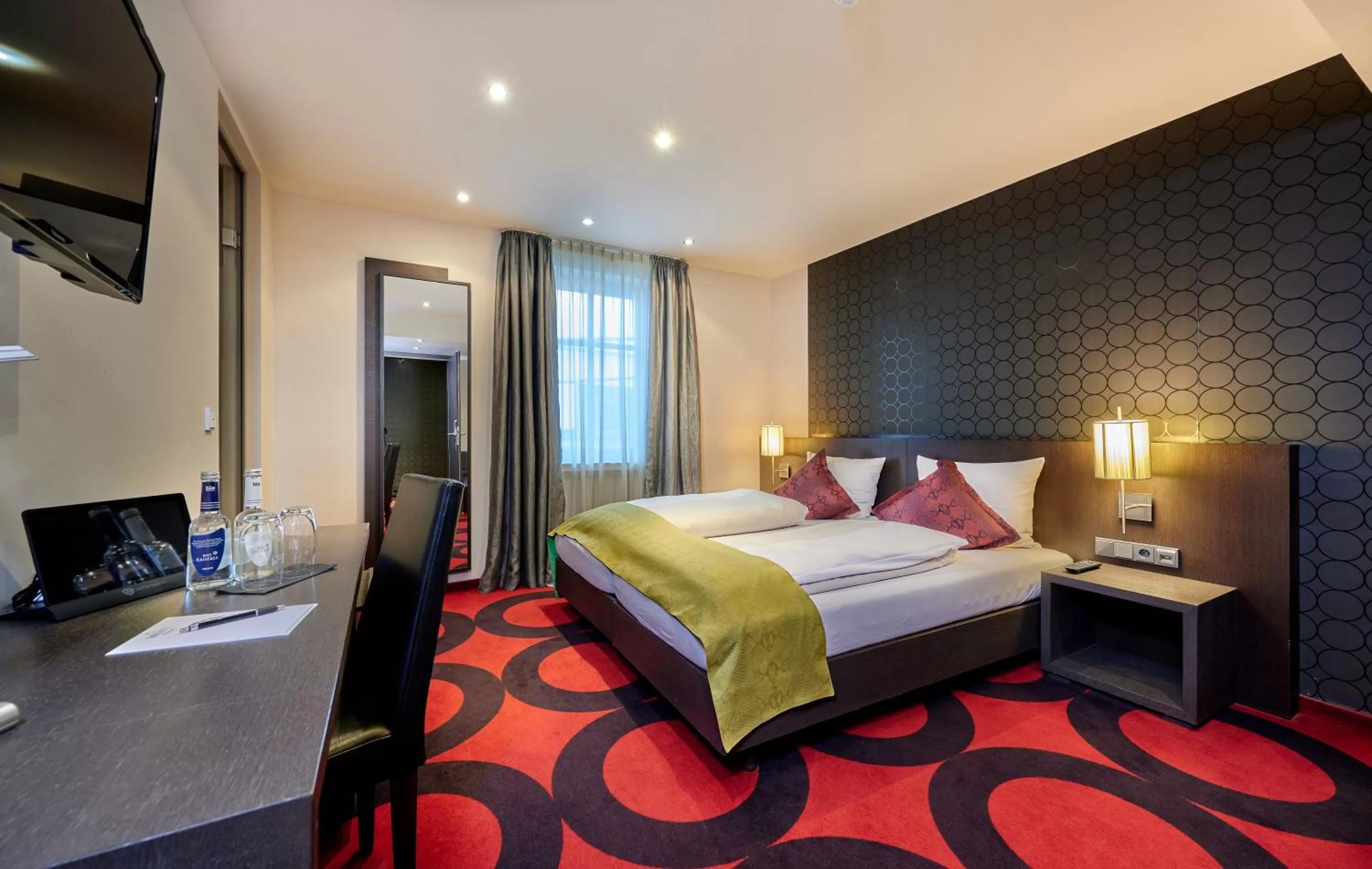 Photo of the whole room, Bed in Genusshotel Wenisch