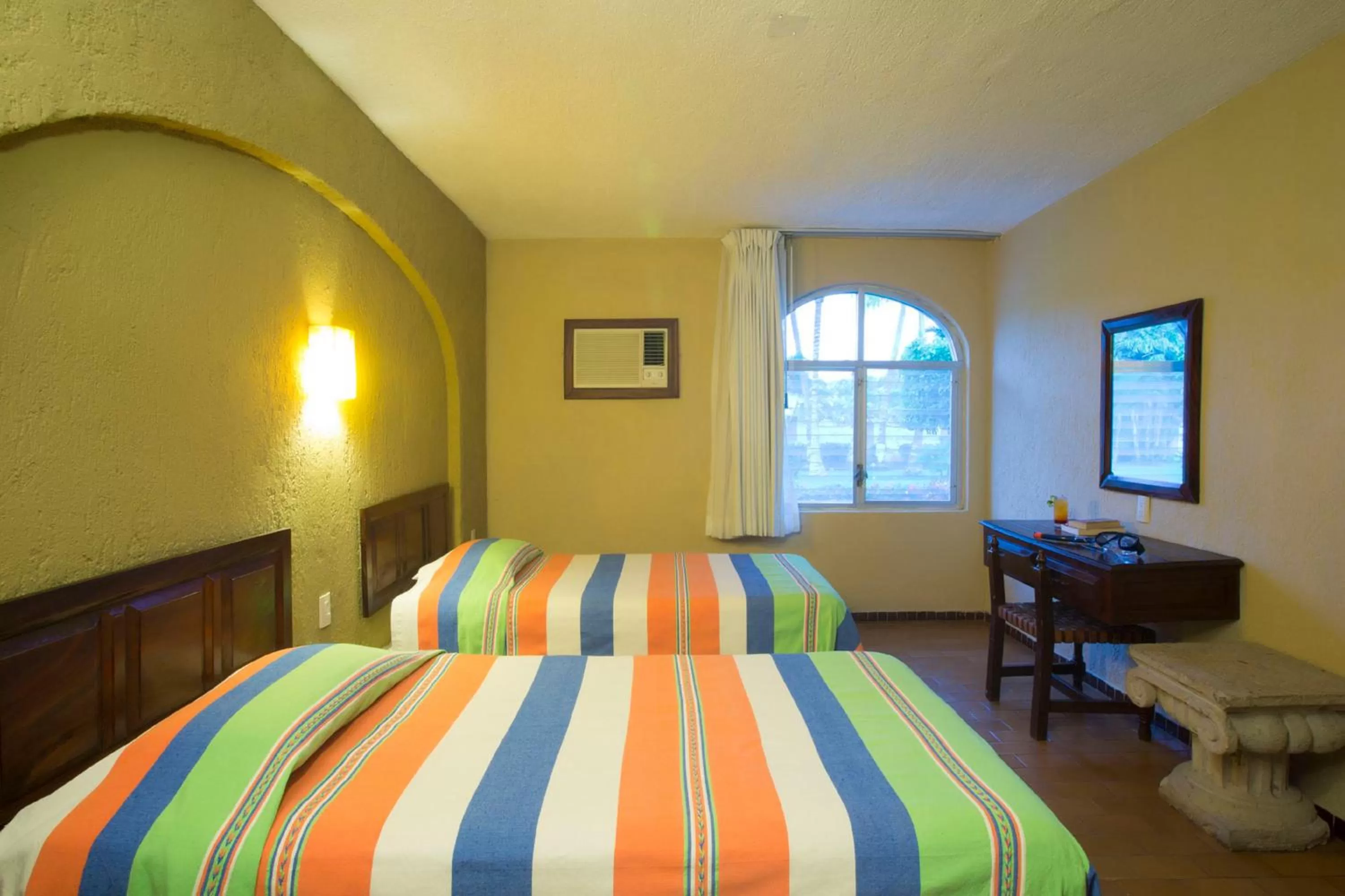 Bed in Vista Vallarta All Suites On The Beach