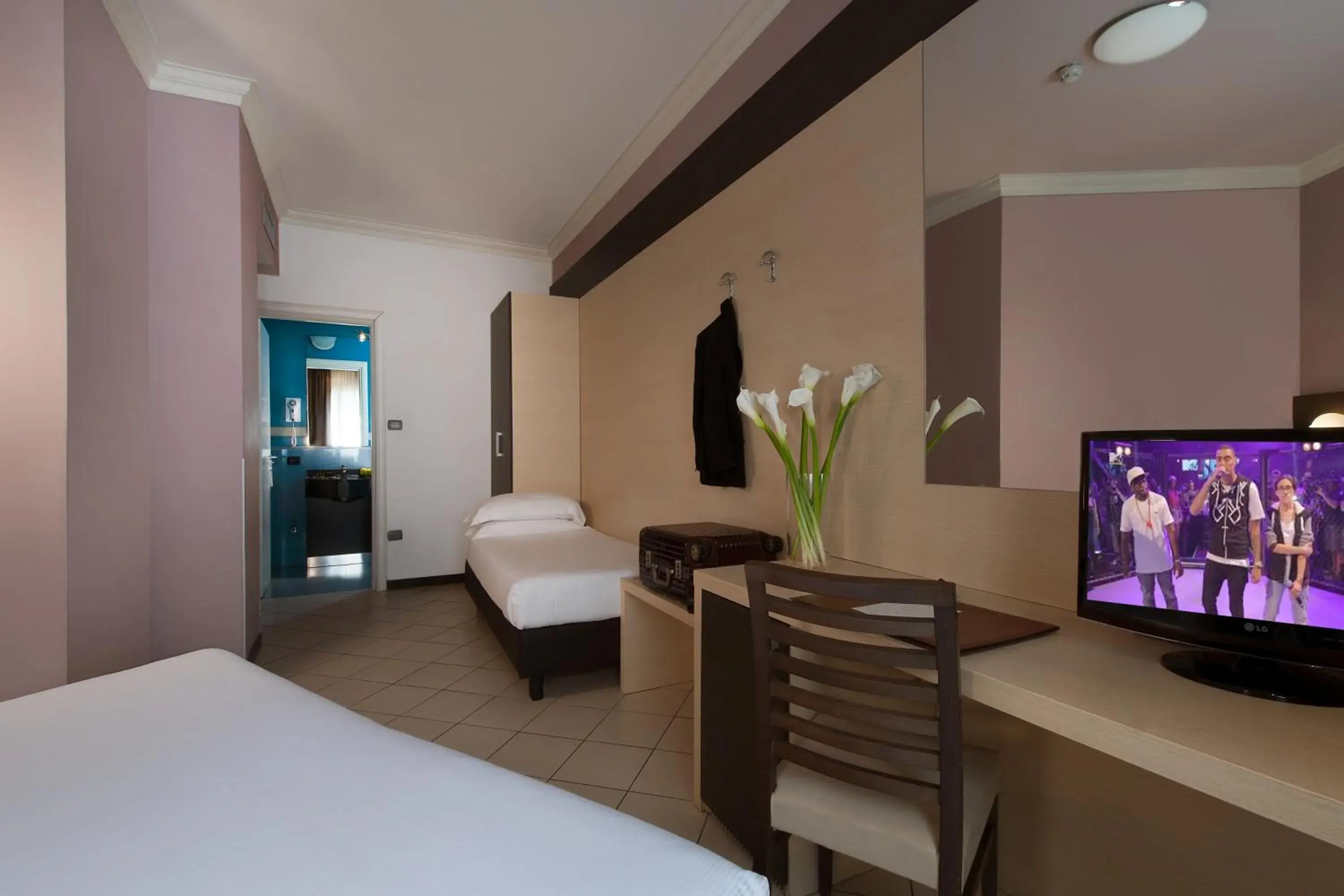 Bedroom, Seating Area in CDH Hotel La Spezia