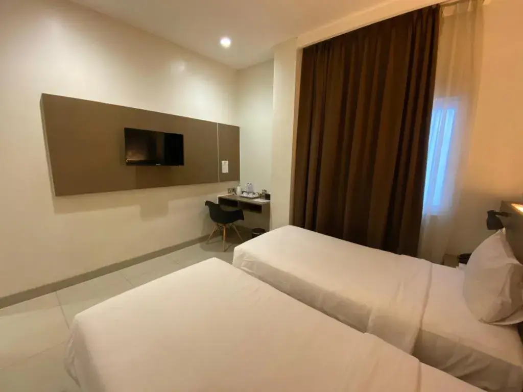 Bed in OPI INDAH Hotel