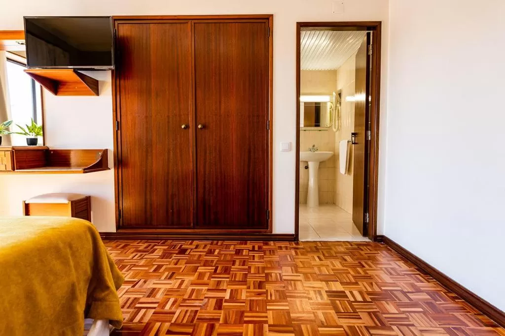 Toilet in Dona Amélia Hotel by RIDAN Hotels