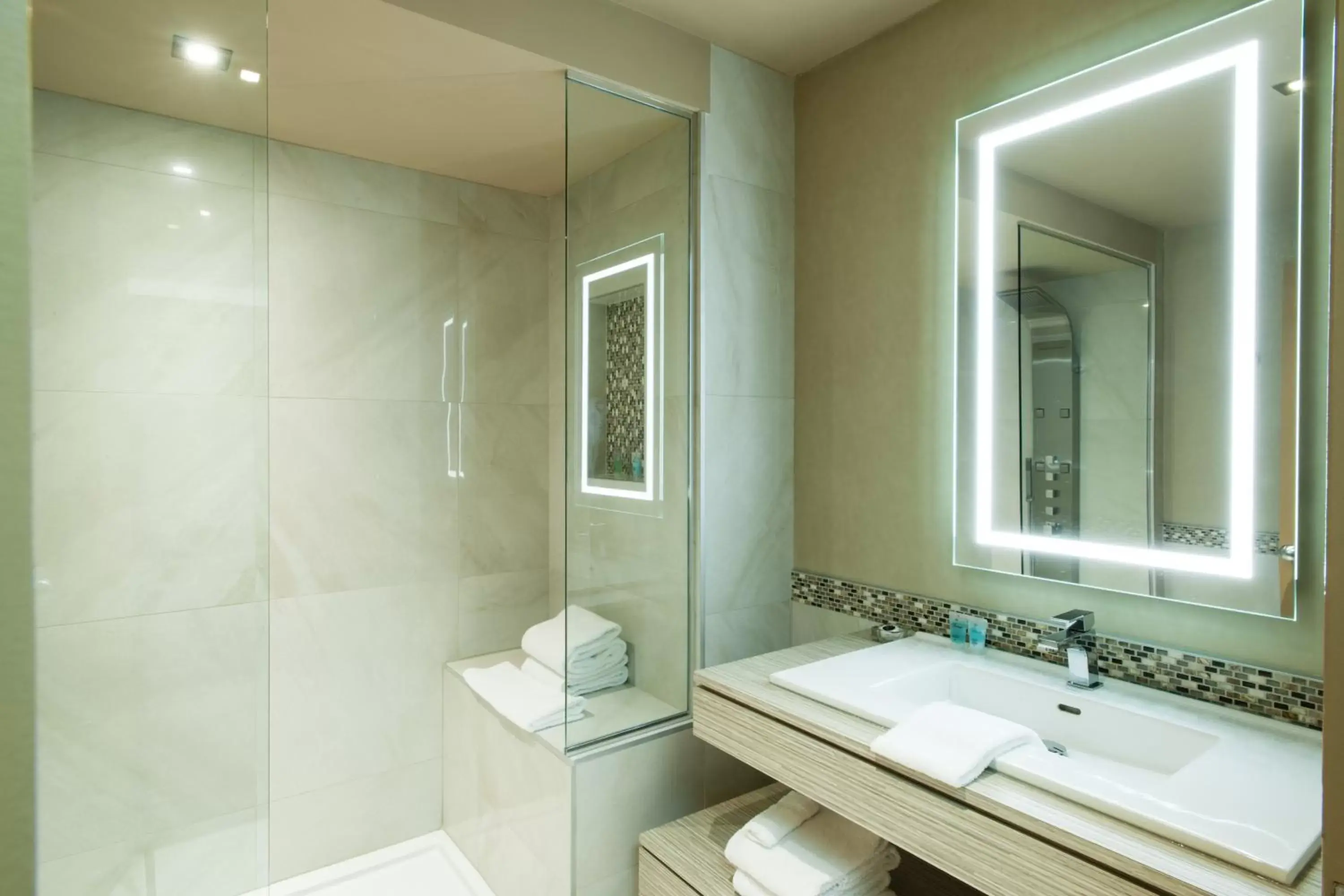 Bathroom in Le Chabrol Hotel & Suites