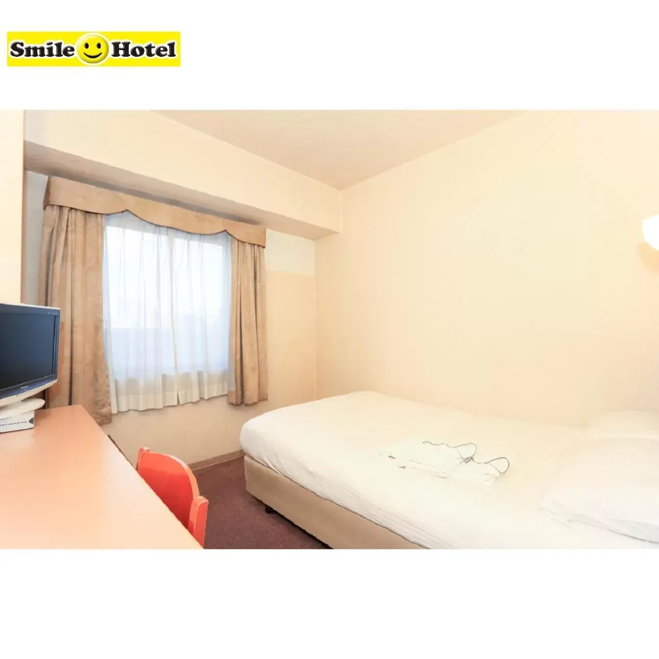 Bed in Smile Hotel Asahikawa