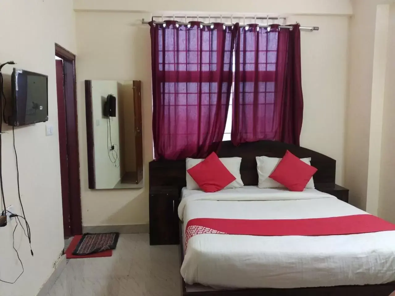 Bedroom in STAYMAKER Srinivasa Residency