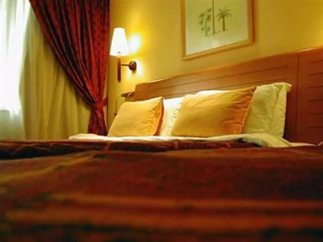 Bed in Hotel Claresta
