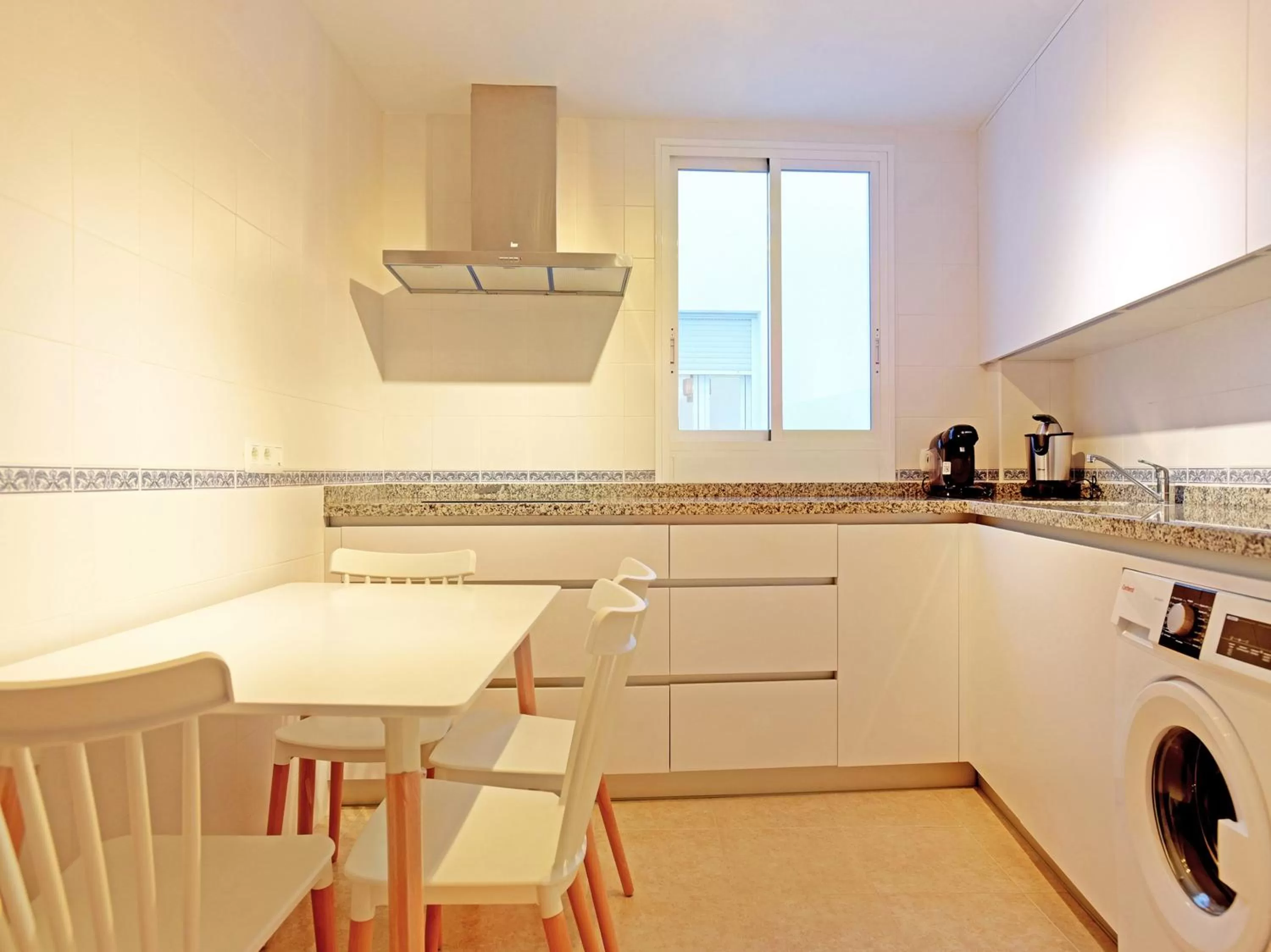 Kitchen or kitchenette in Apartamentos Santiago