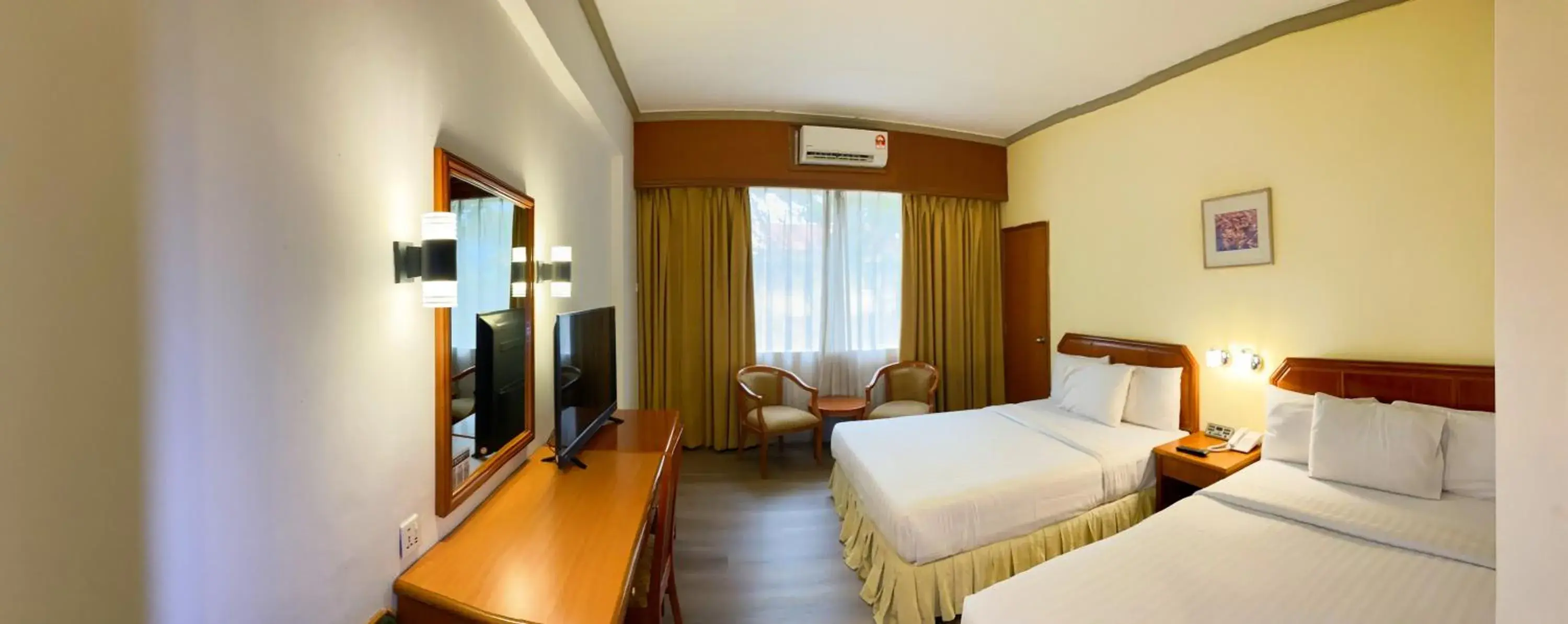 Communal lounge/ TV room in Hotel Sandakan