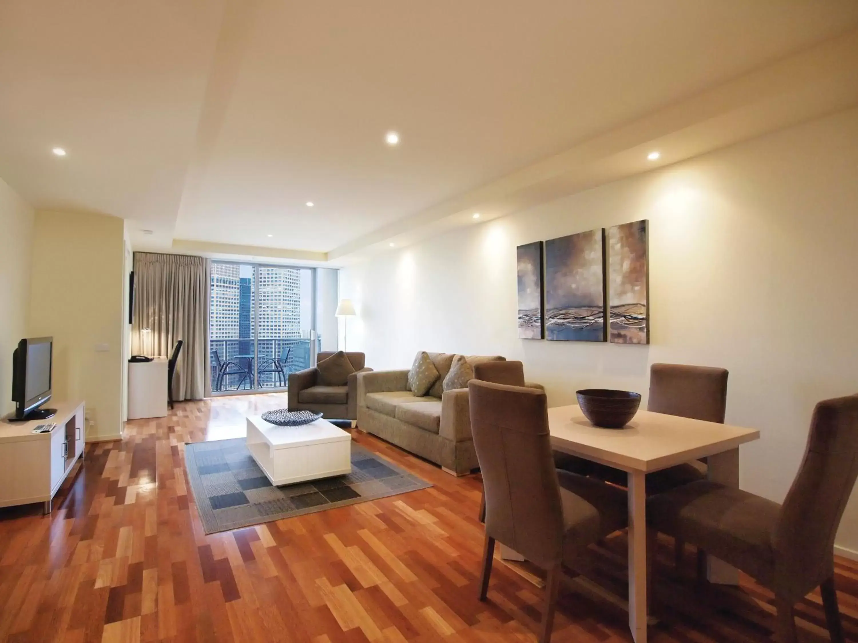 Living room, Dining Area in Oaks Melbourne on Lonsdale Suites