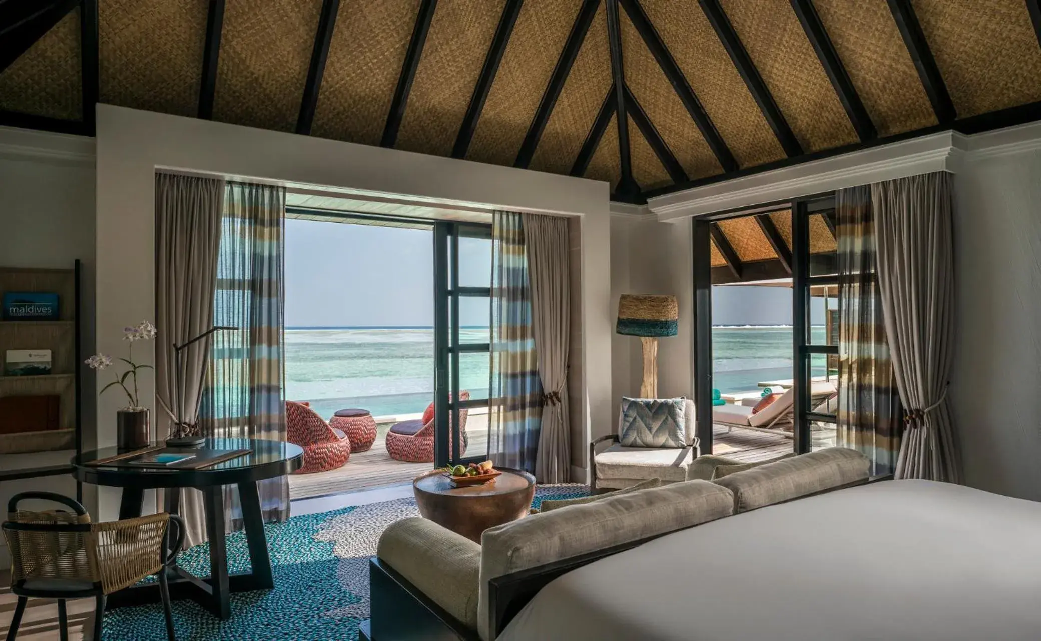 Bedroom, Seating Area in Four Seasons Resort Maldives at Kuda Huraa