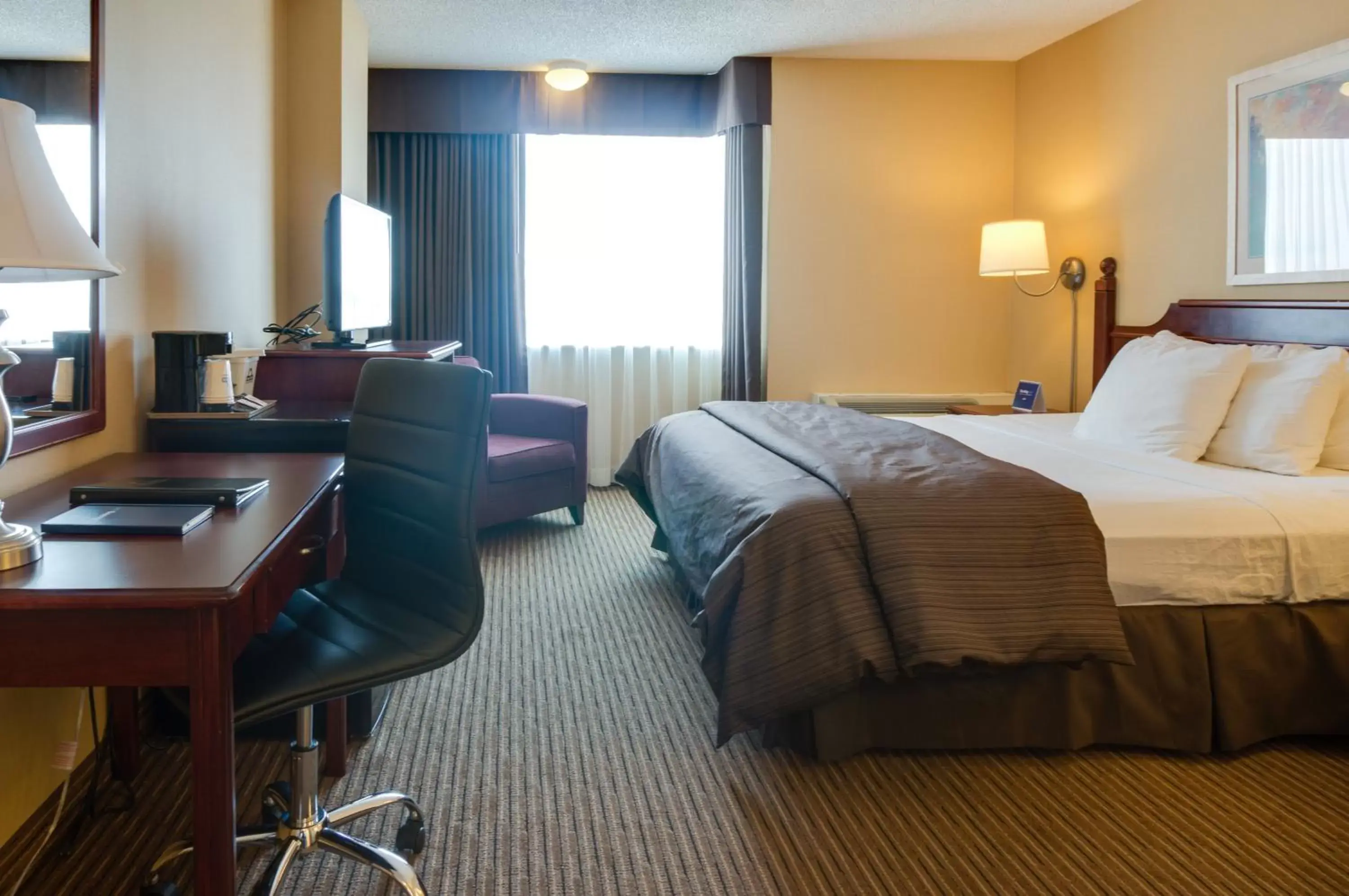 Photo of the whole room, Bed in Days Inn by Wyndham Calgary South