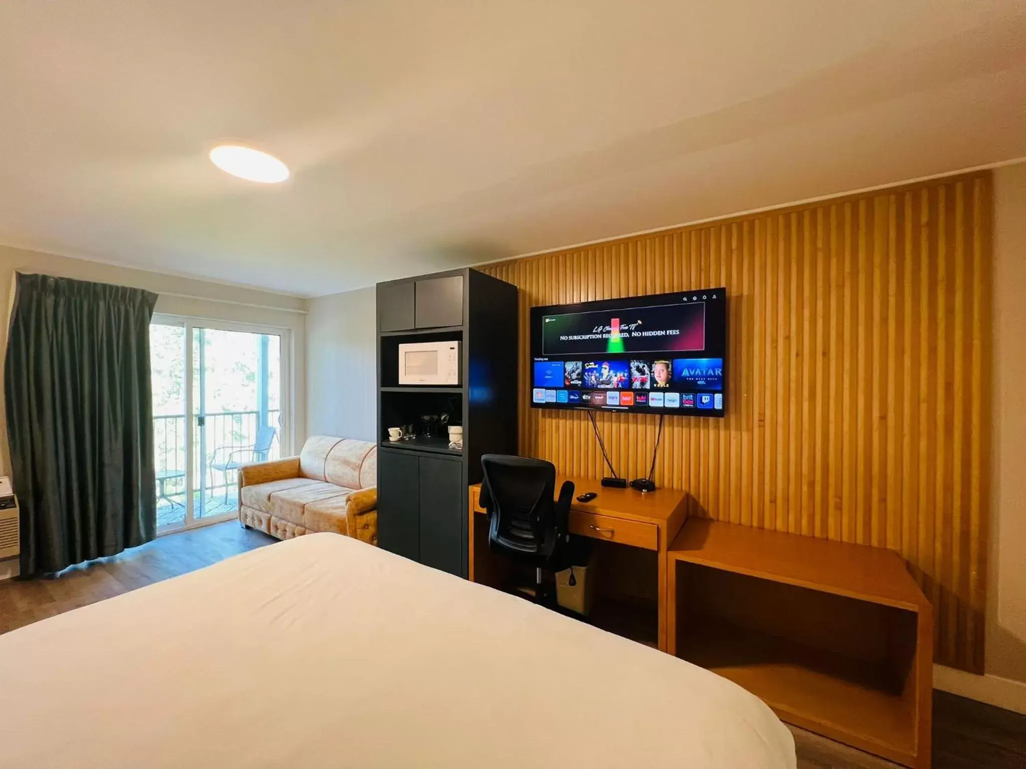 TV/Entertainment Center in Hotel Civilia Lakeside by Civilia Golf Retreat