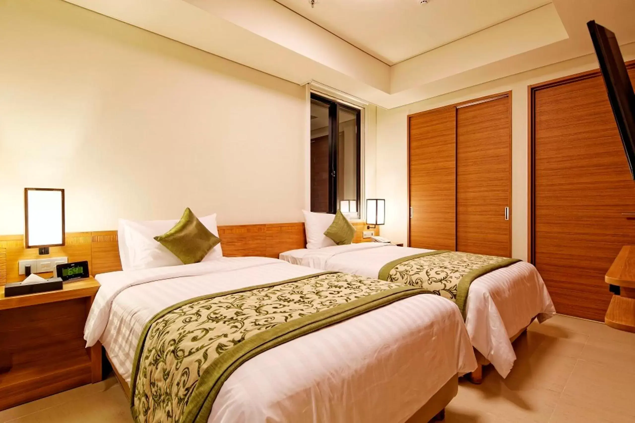 Decorative detail, Bed in Axia South Cikarang Service Apartment