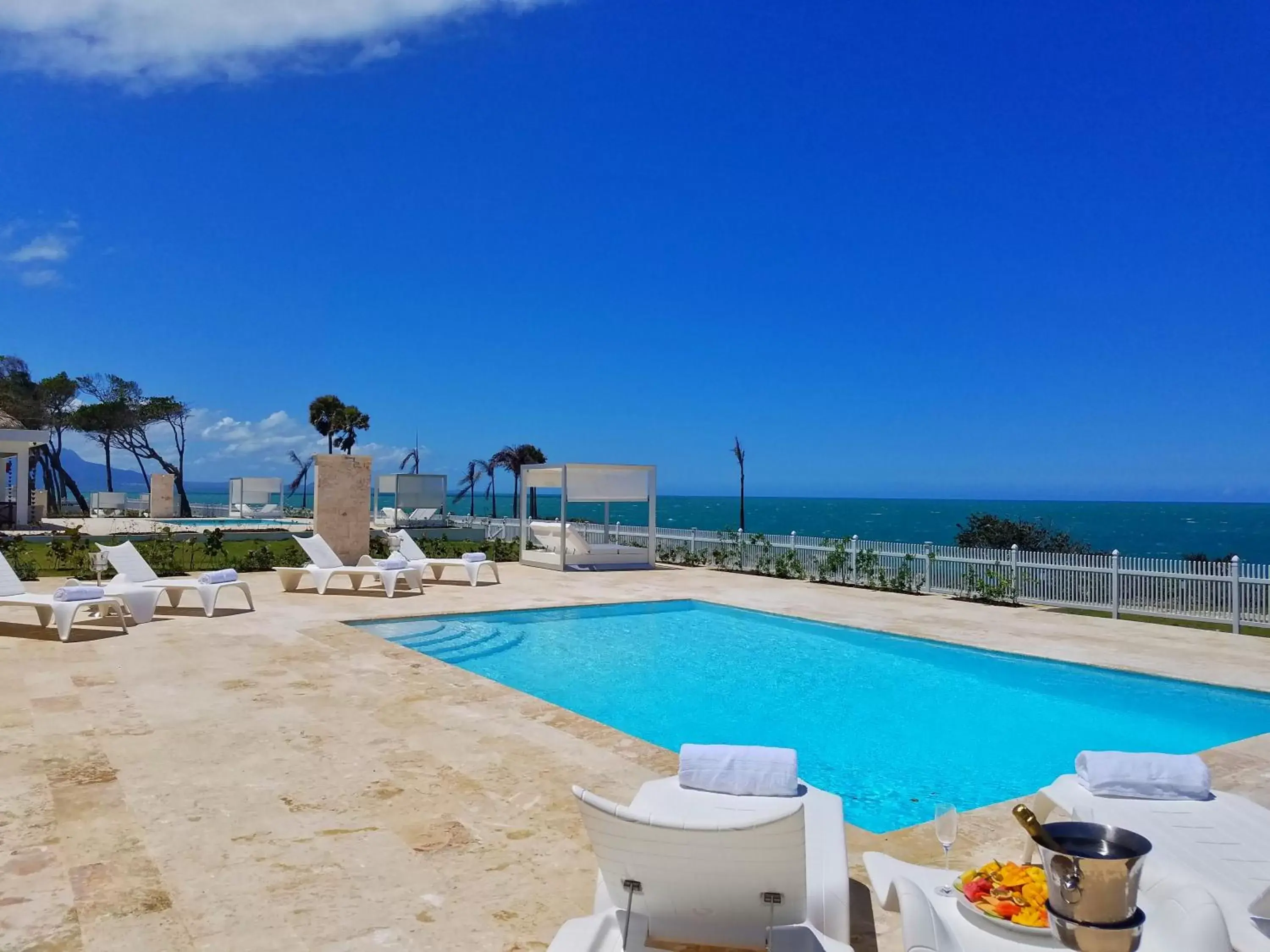 Patio, Swimming Pool in Ocean Village Deluxe Resort & Spa