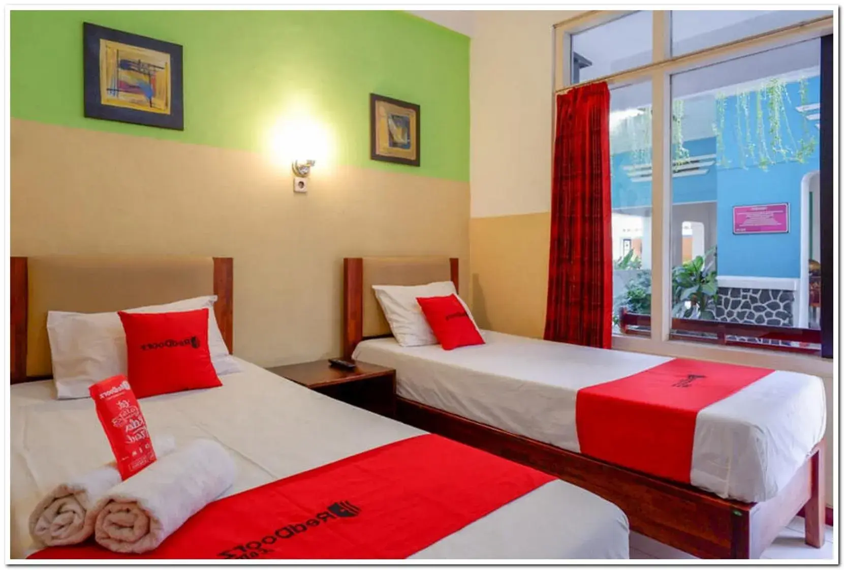 Bed in RedDoorz @ Prawirotaman Bed in RedDoorz @ Prawirotaman