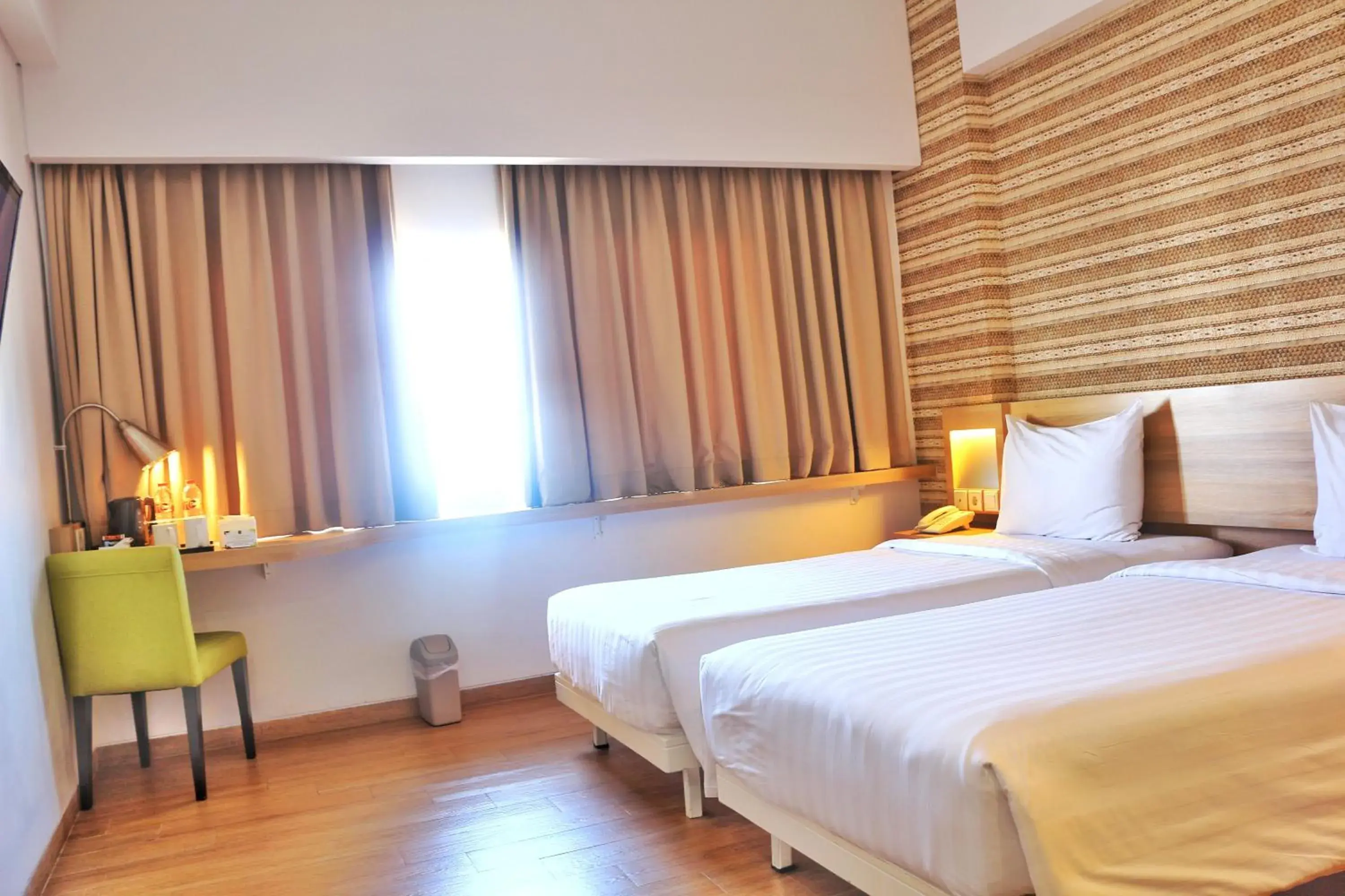 Bed in Whiz Prime Hotel Basuki Rahmat Malang Bed in Whiz Prime Hotel Basuki Rahmat Malang