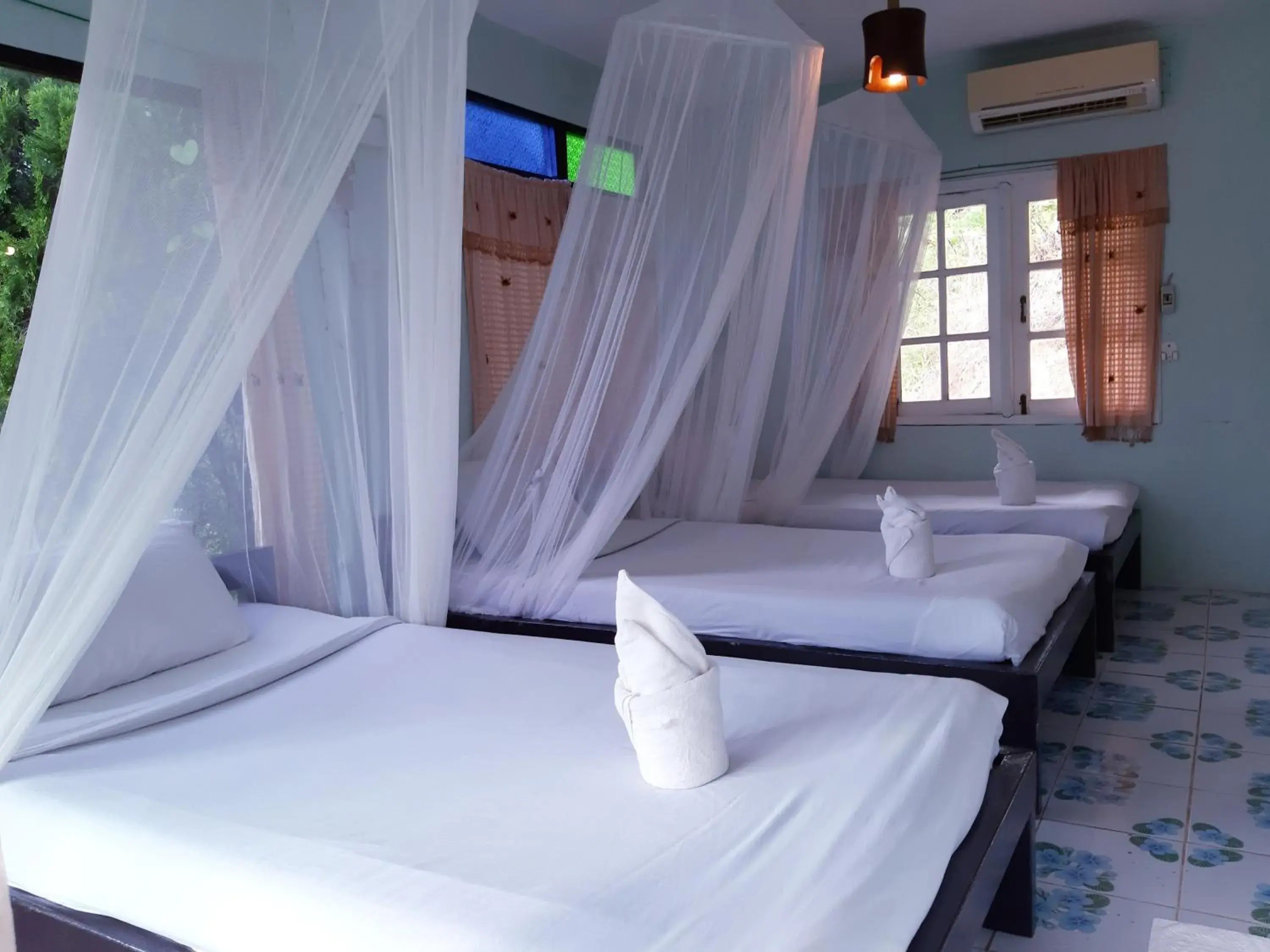 Triple Room in Chang Pai Resort Triple Room in Chang Pai Resort