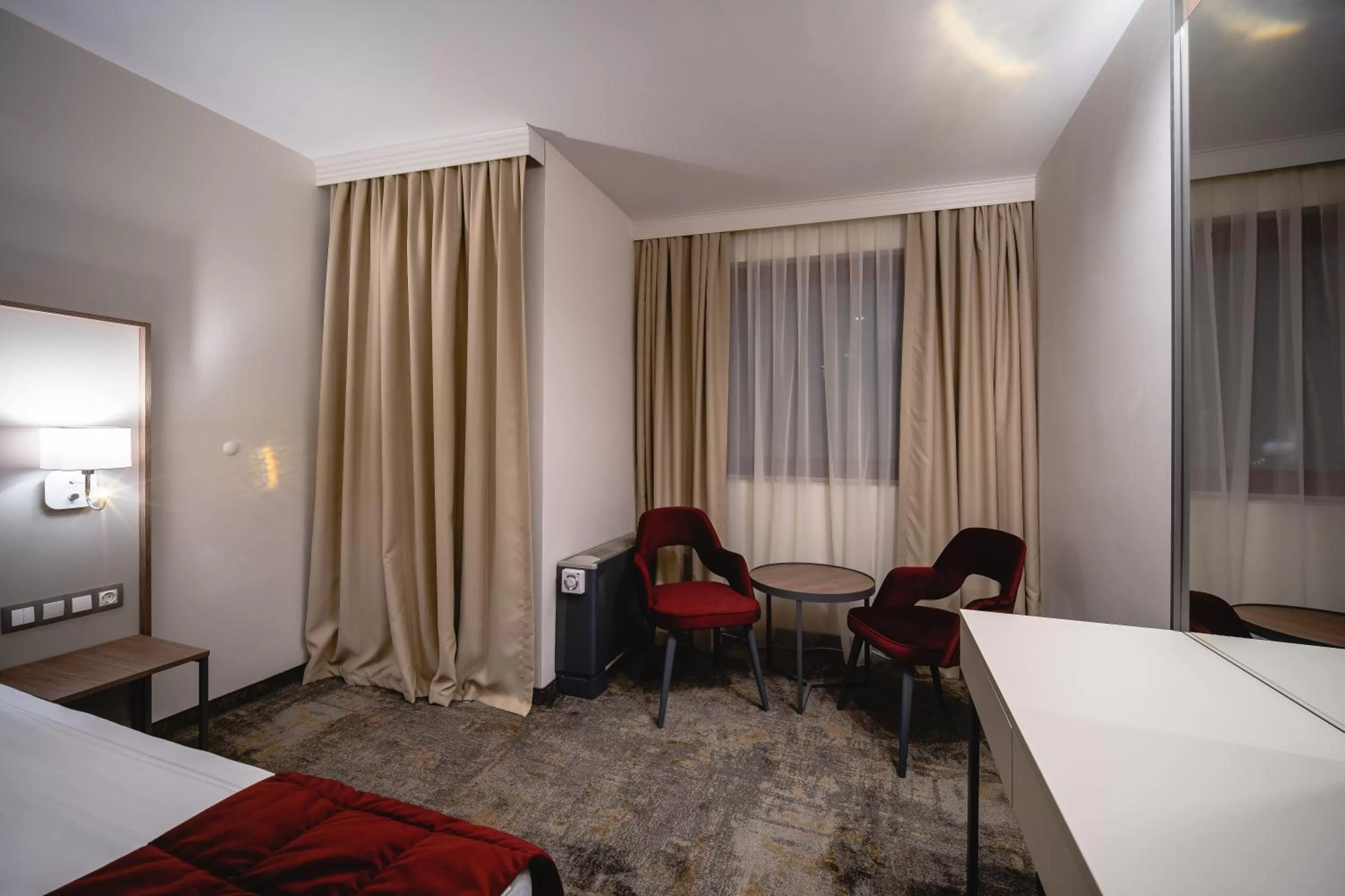 Seating area, Bed in Saint George Hotel & Medical Spa