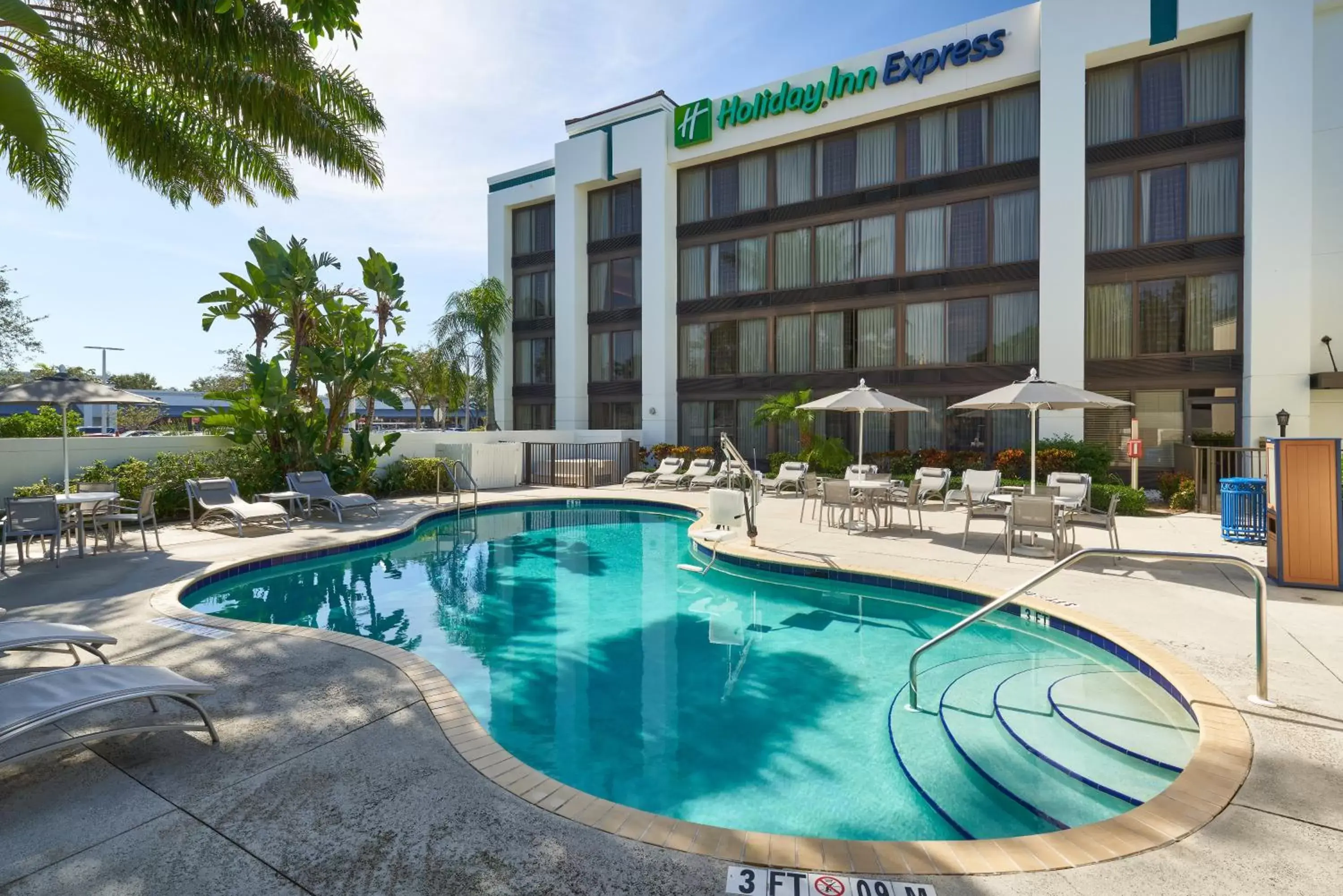 Property building, Swimming Pool in Holiday Inn Express Boca Raton - West, an IHG Hotel