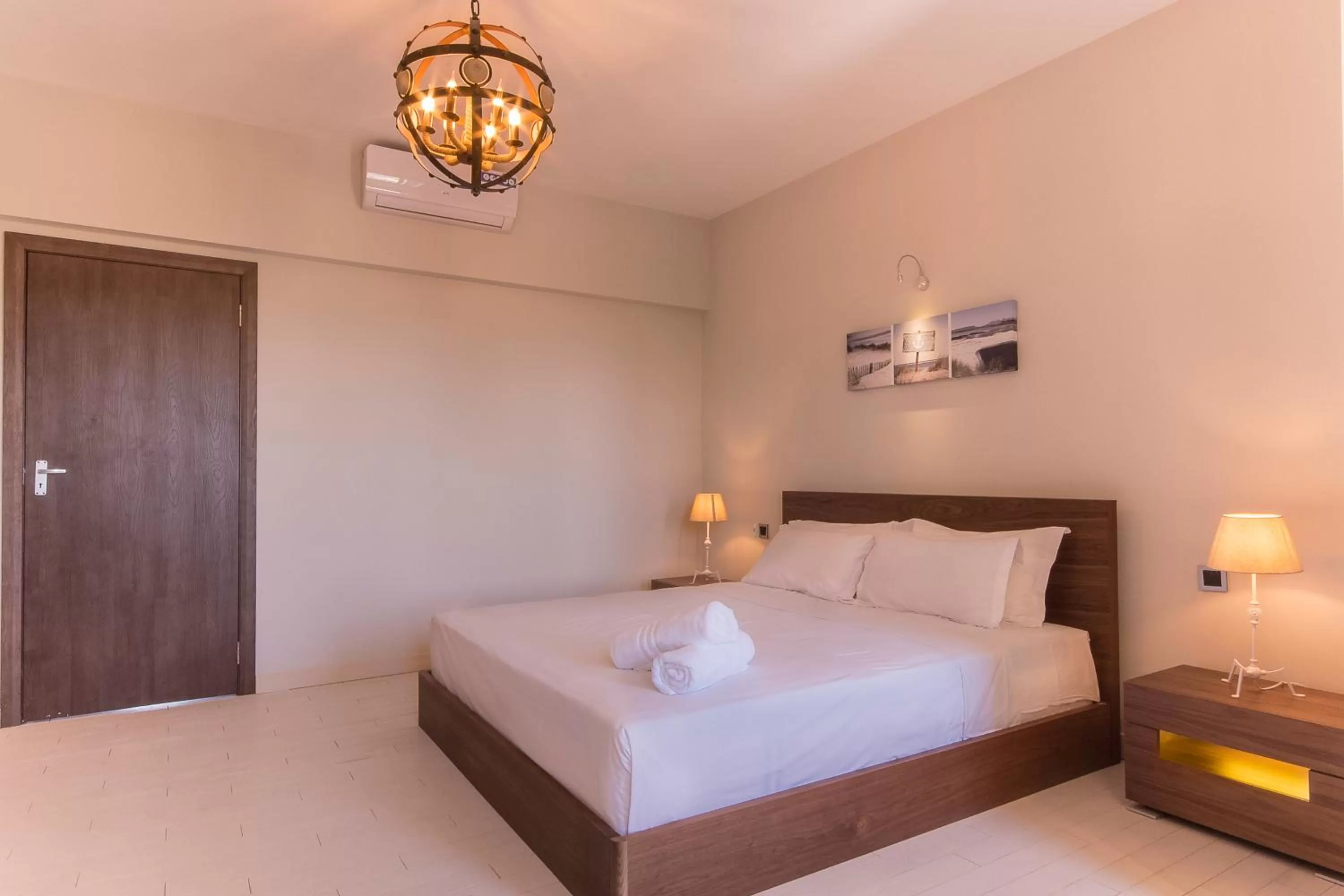 Bed in Azure Beach Boutique Hotel