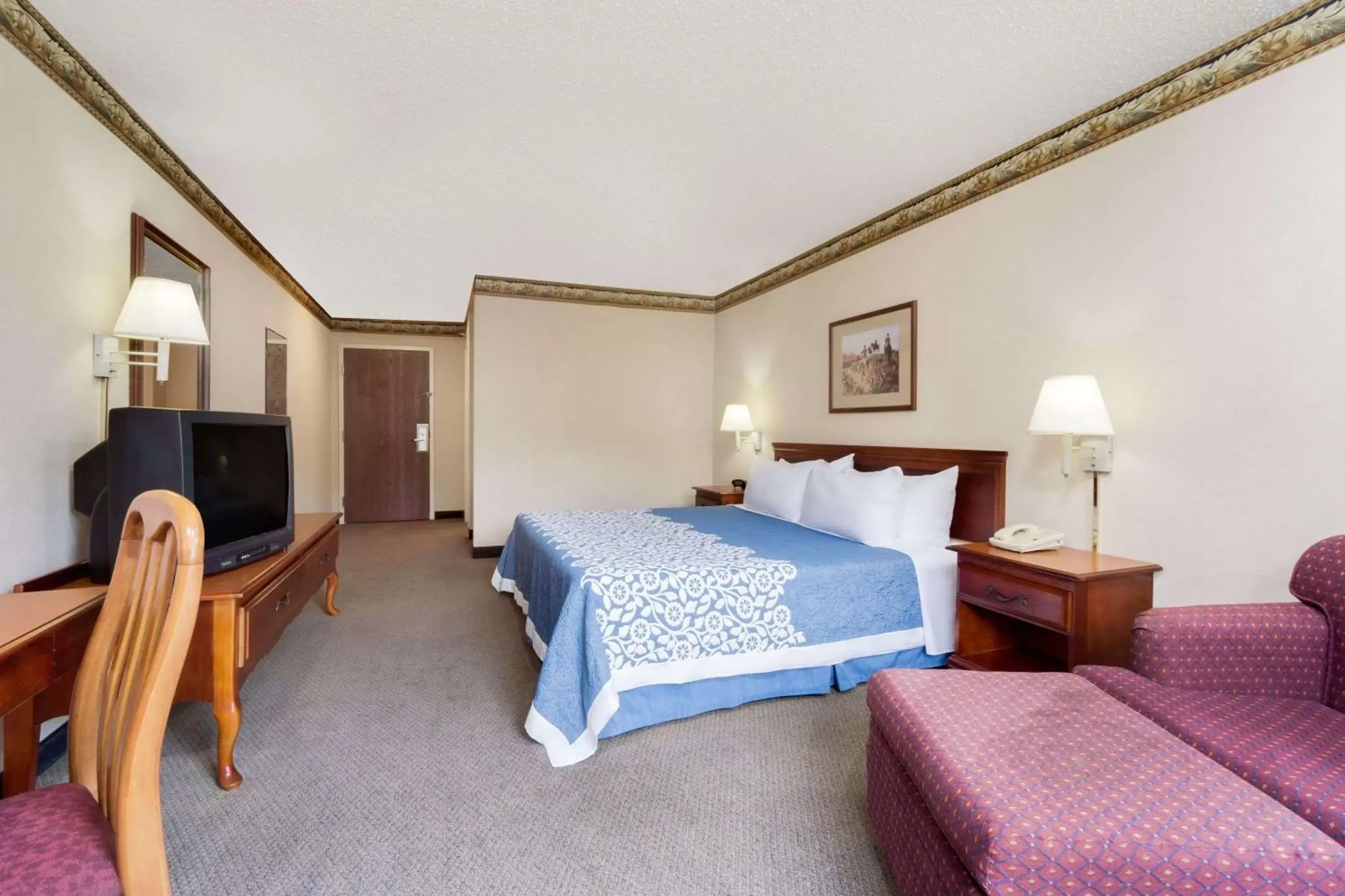 Photo of the whole room, Bed in Magnuson Hotel West Liberty