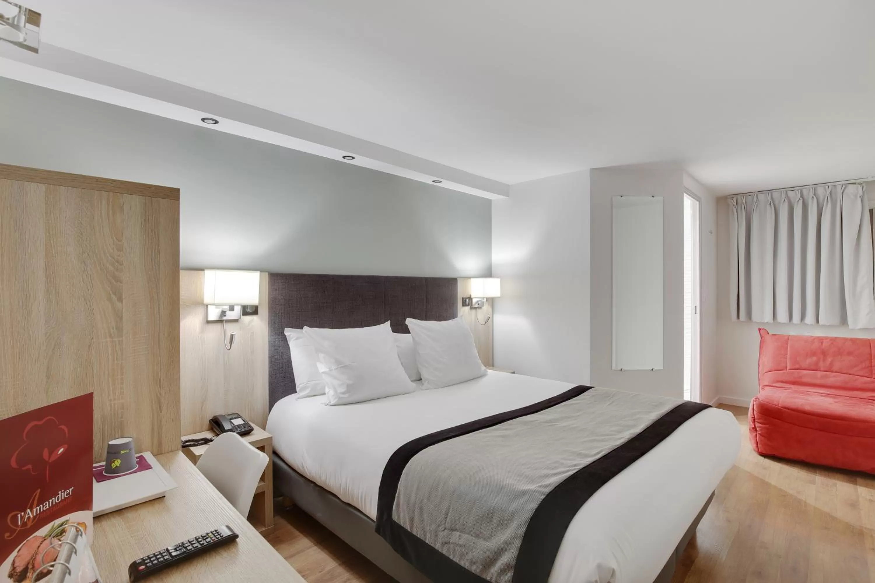 Bed in Hôtel l'Amandier