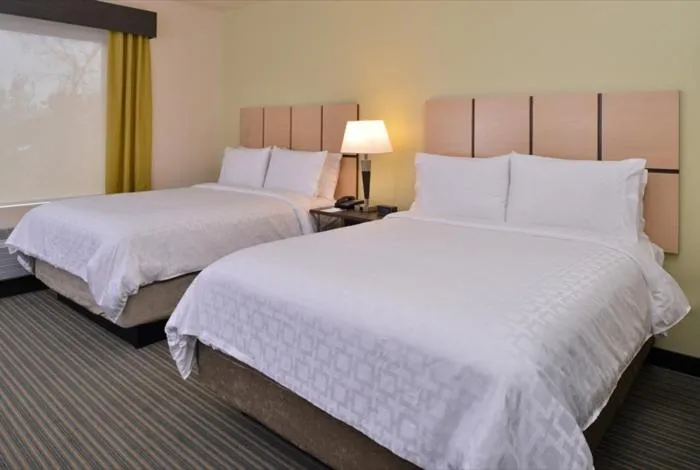 Bed in Candlewood Suites - Austin Airport by IHG