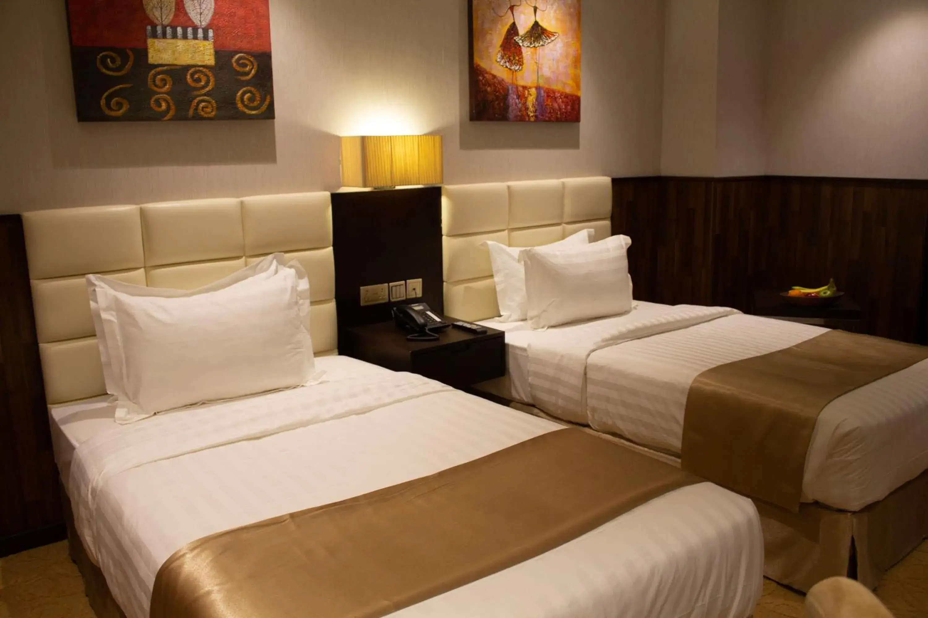 Bed in The Secure Inn Hotel Muscat